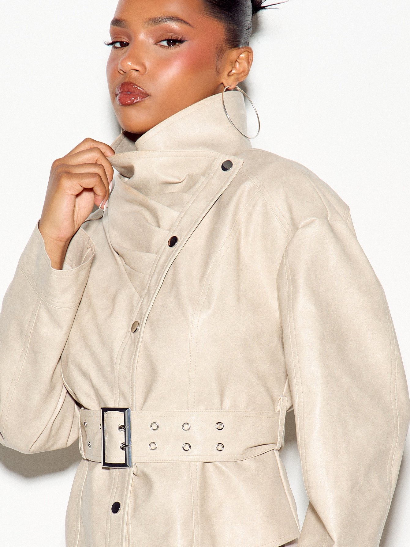 Oversized belted jacket with high neck