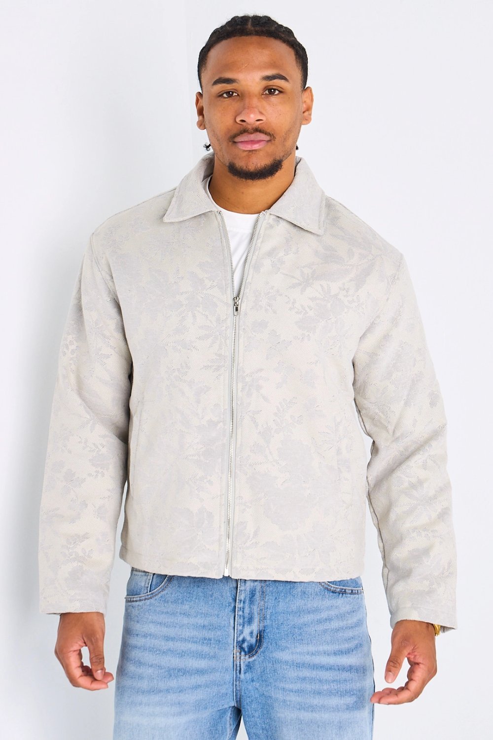 Light grey zip-up jacket with floral print