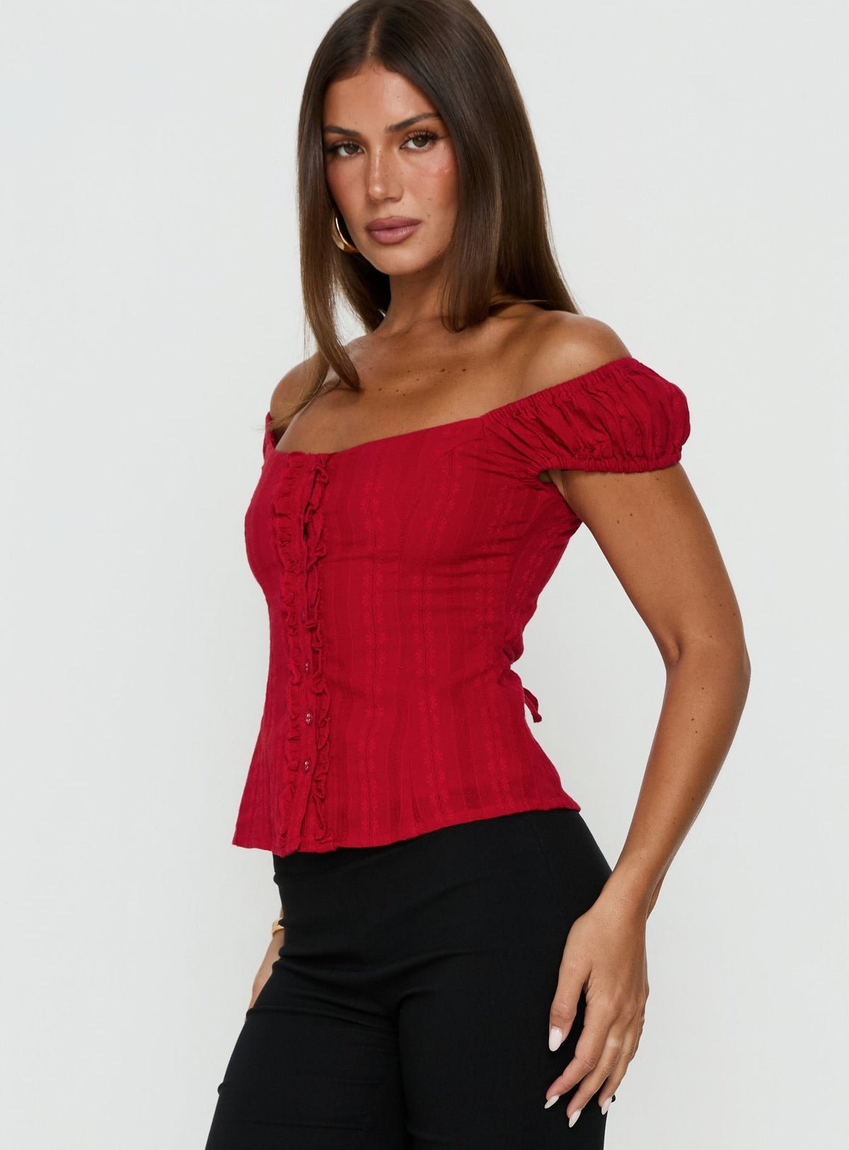 Off-shoulder button-up frill top