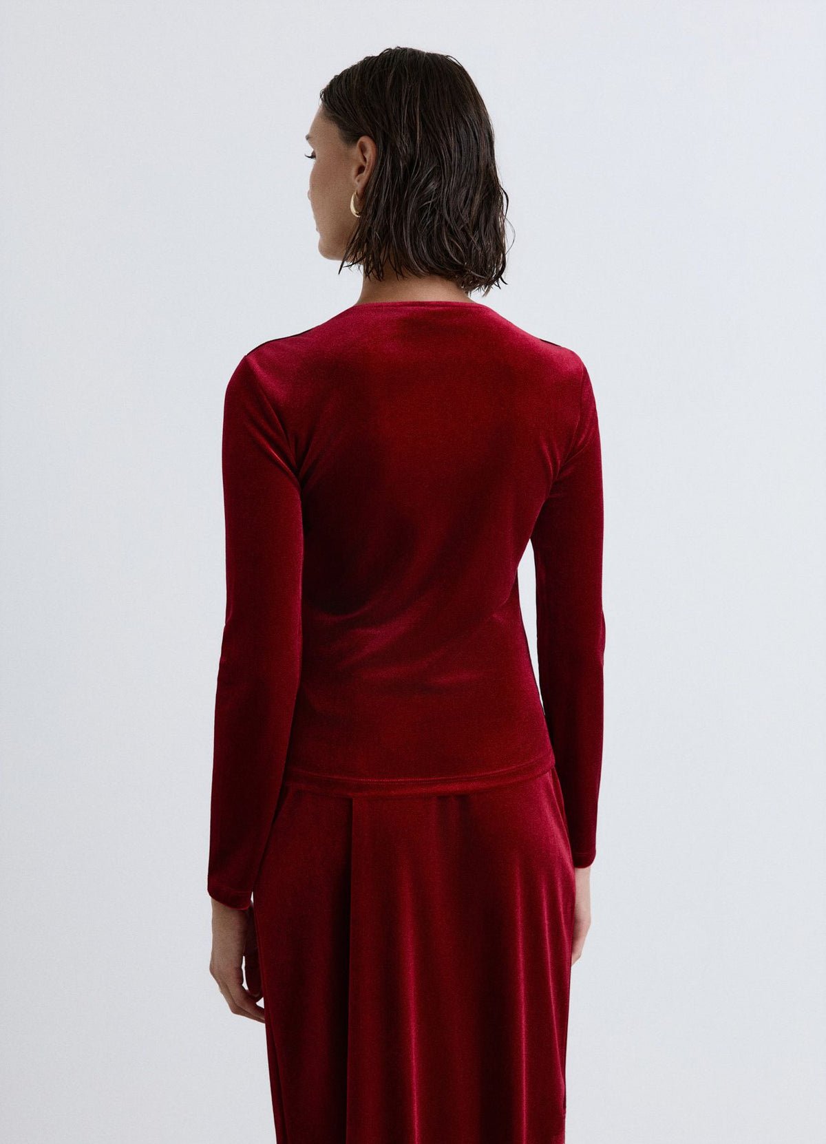 Gathered V-neck top with jewel detail