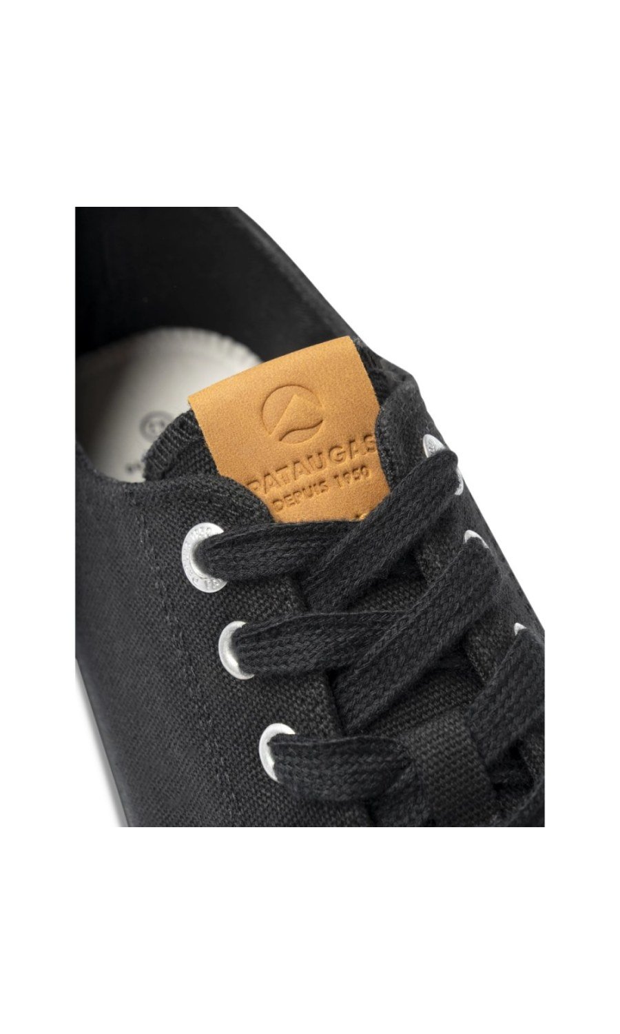 Black canvas trainers, striped sole