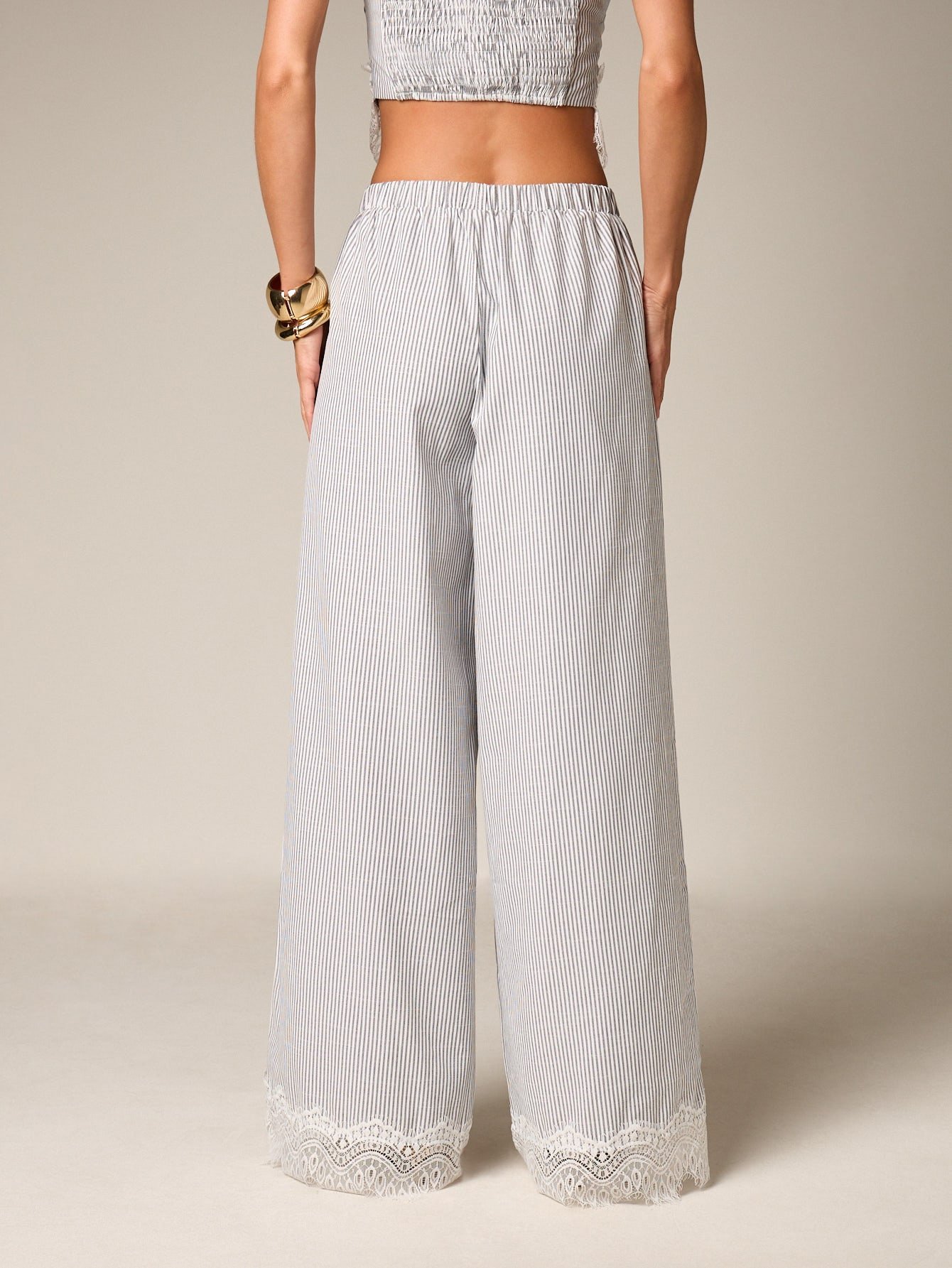 Pantalon palazzo à jambes larges avec ourlet