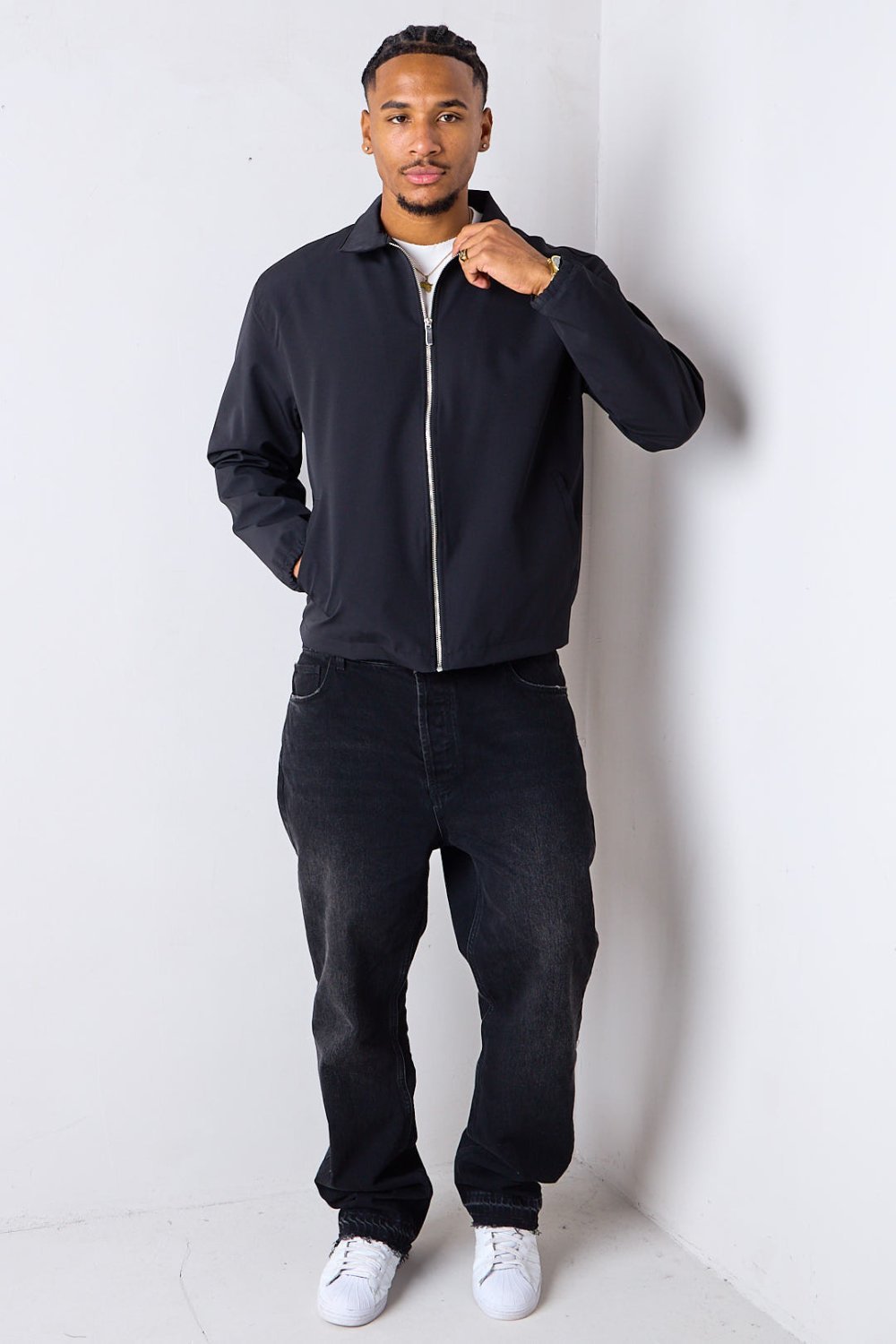 Black zip-up transitional jacket with collar