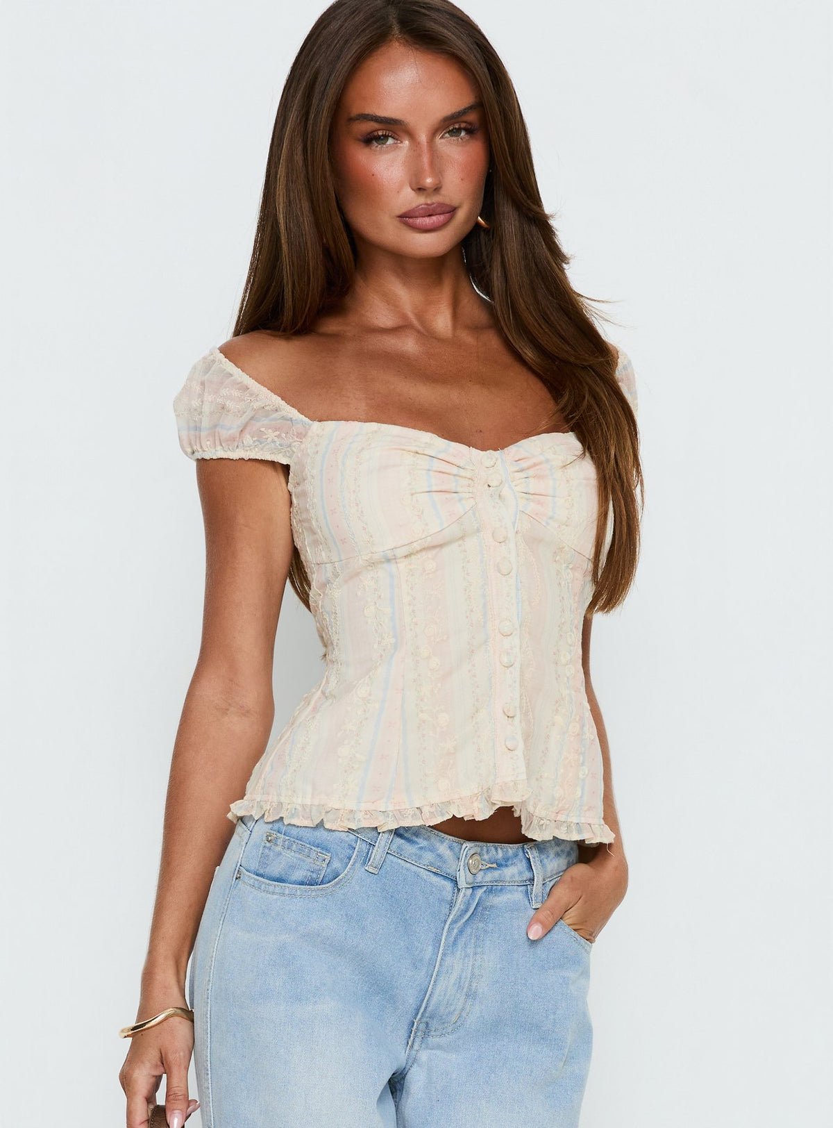 Blouse fleurie boutonnée à mancherons
