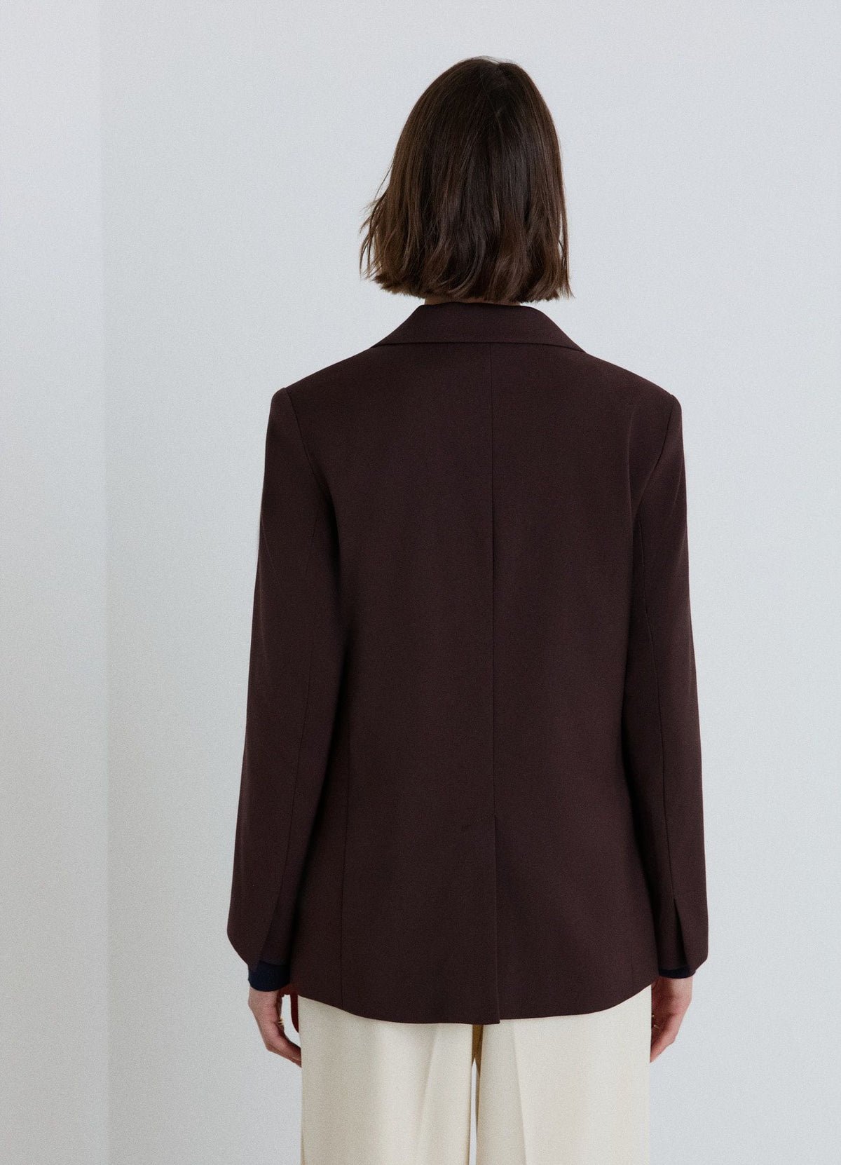 Wrap blazer with buckle fastening