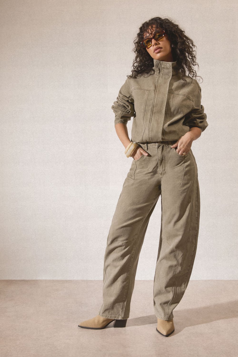 Khaki barrel leg jeans with seam details