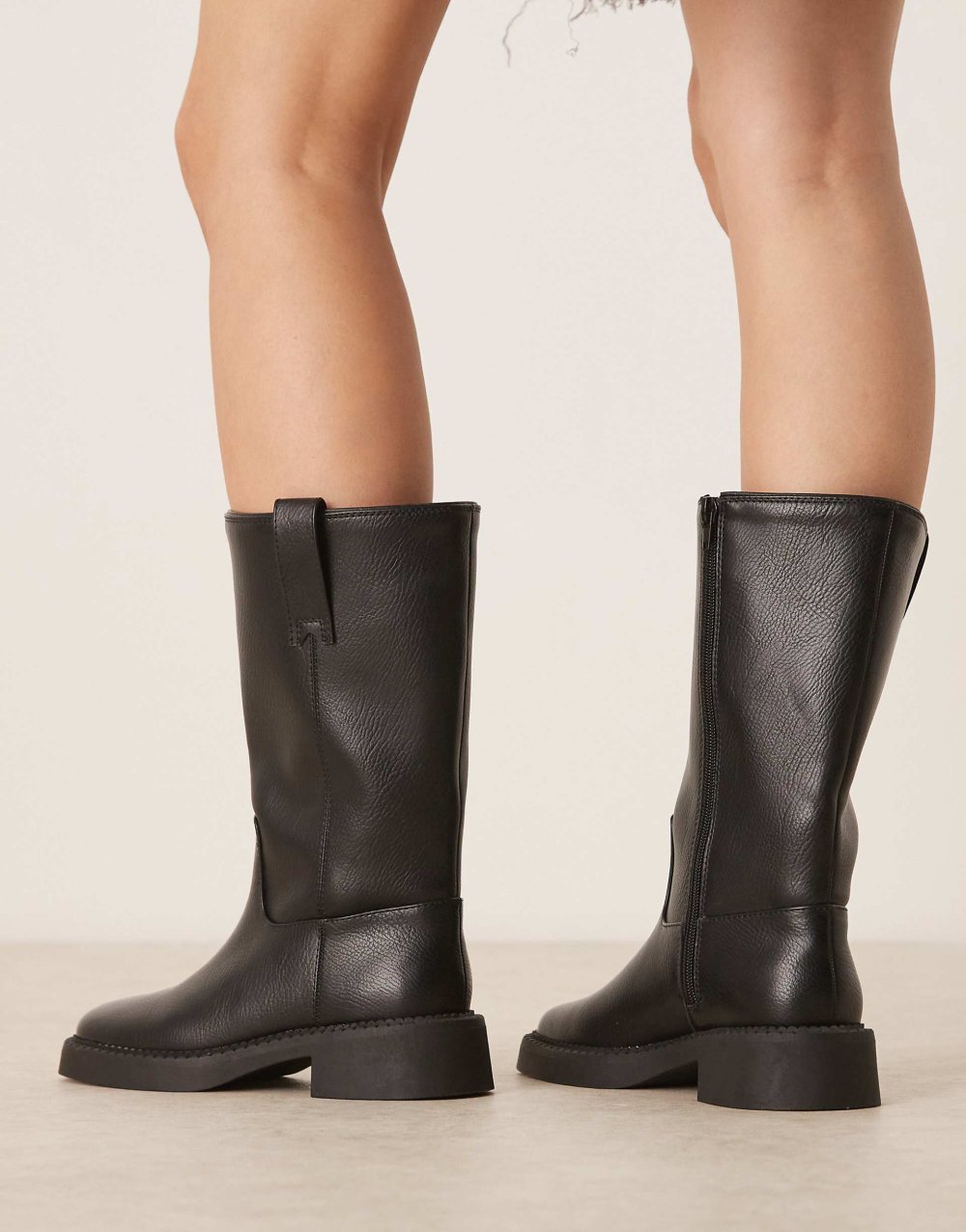 Flat knee high biker boots in black