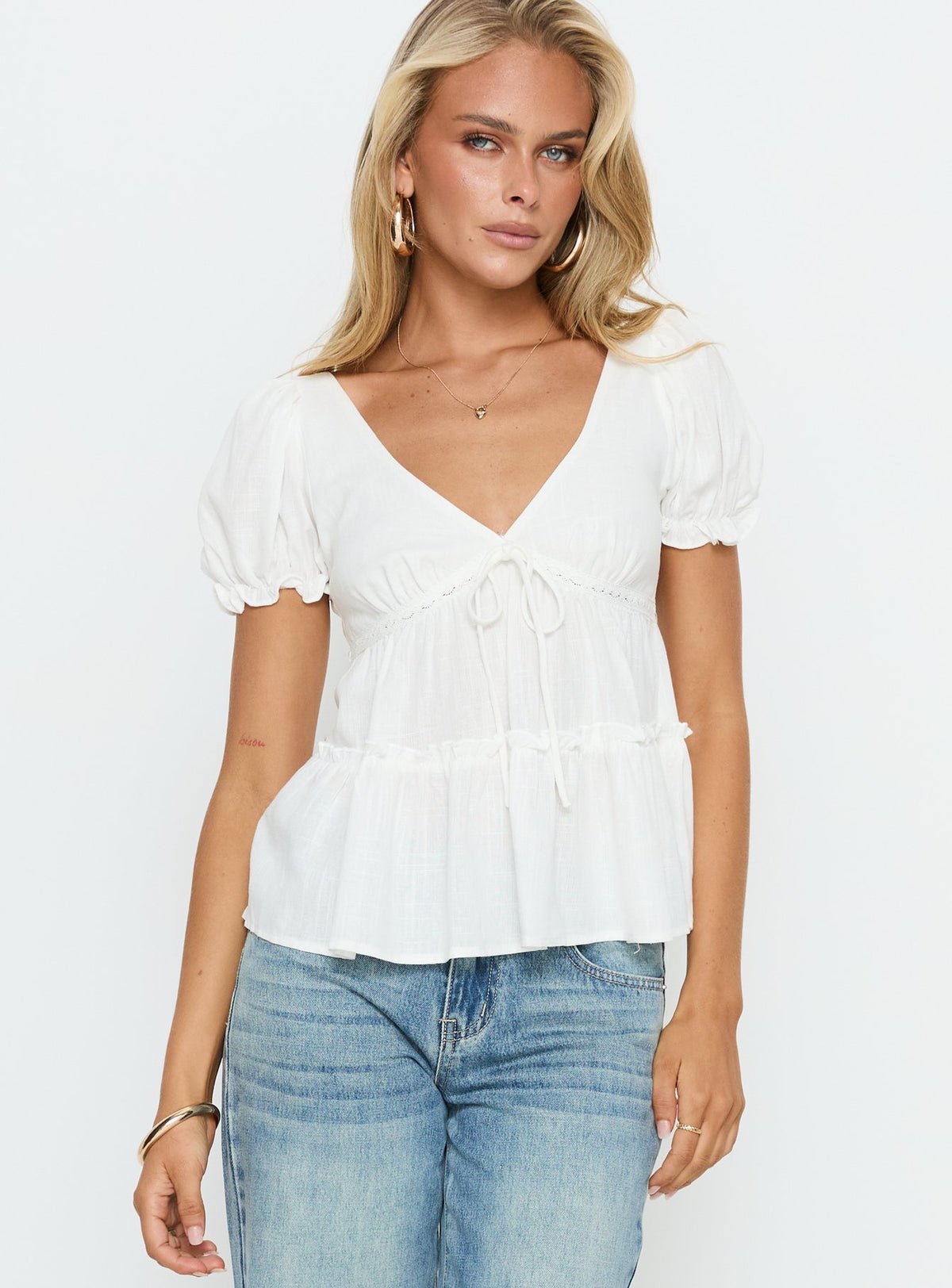 Linen-blend babydoll top with puff sleeves