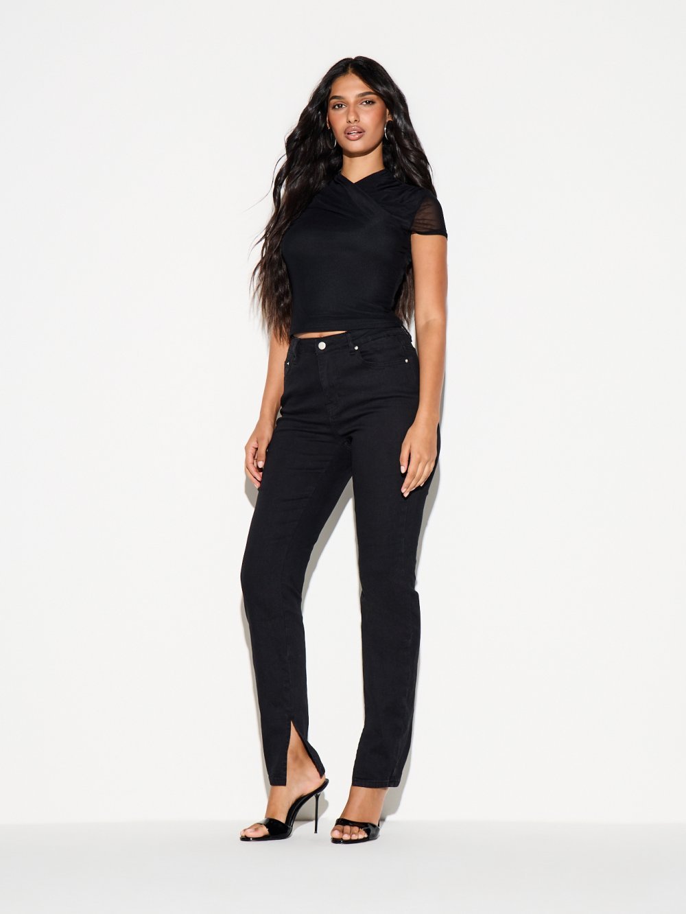 Jean skinny taille haute à ourlet fendu noir