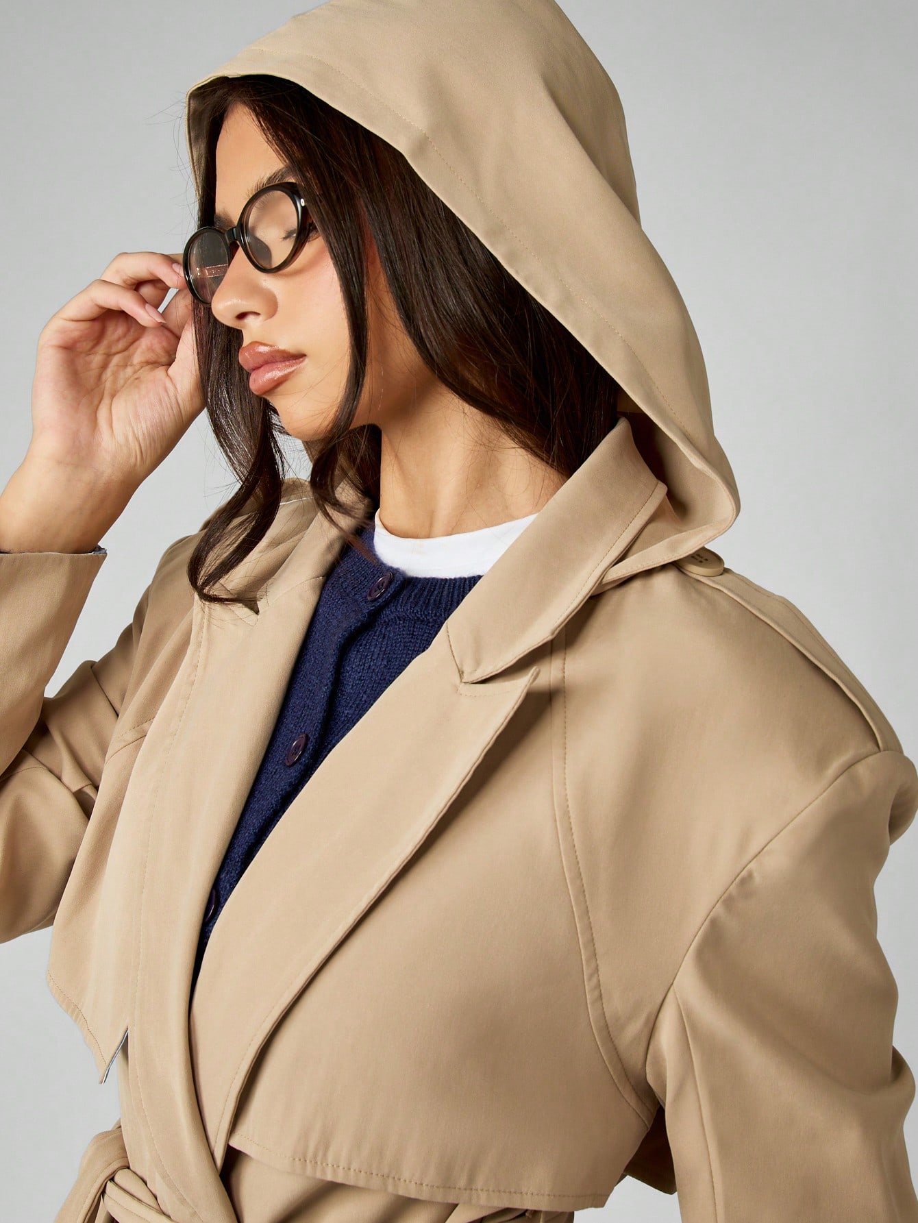 Oversize double-breasted trench coat with hood and belt