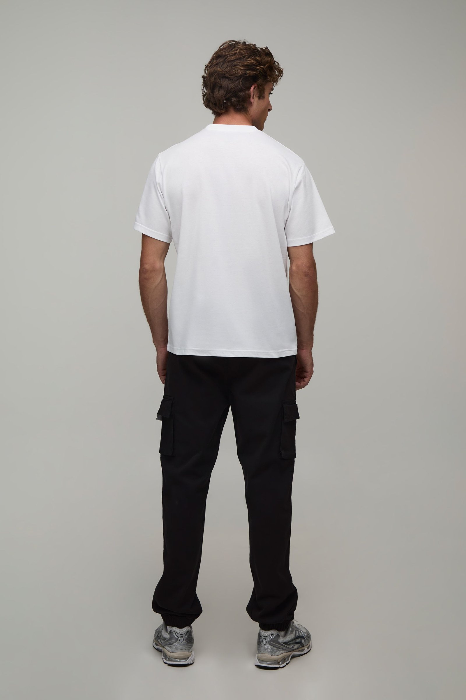 Pantalon cargo slim fit à taille élastiquée, patte tissée et revers aux chevilles