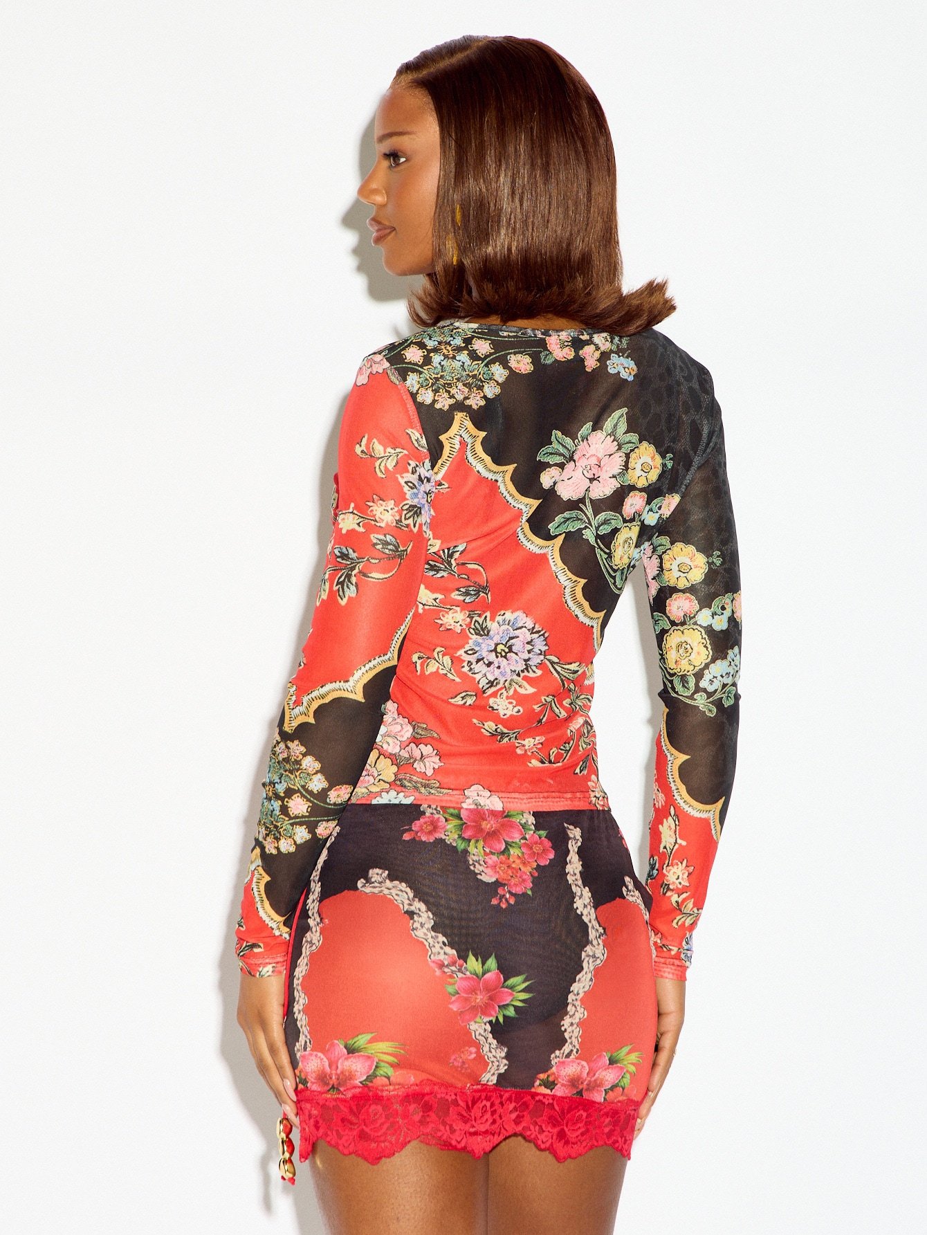 Robe mini en maille florale à manches longues