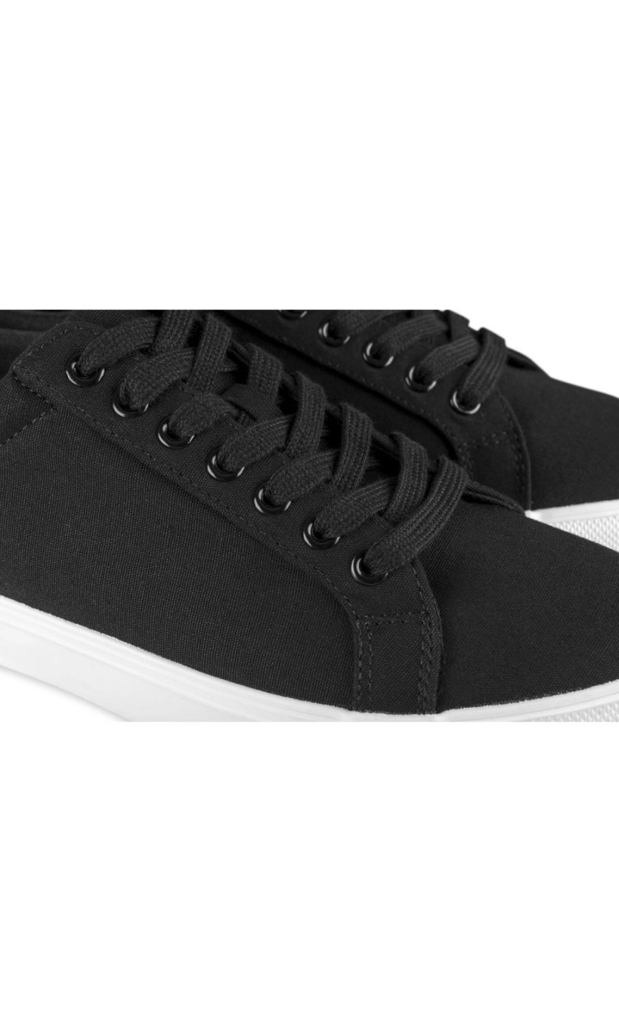 Black low-top canvas trainers