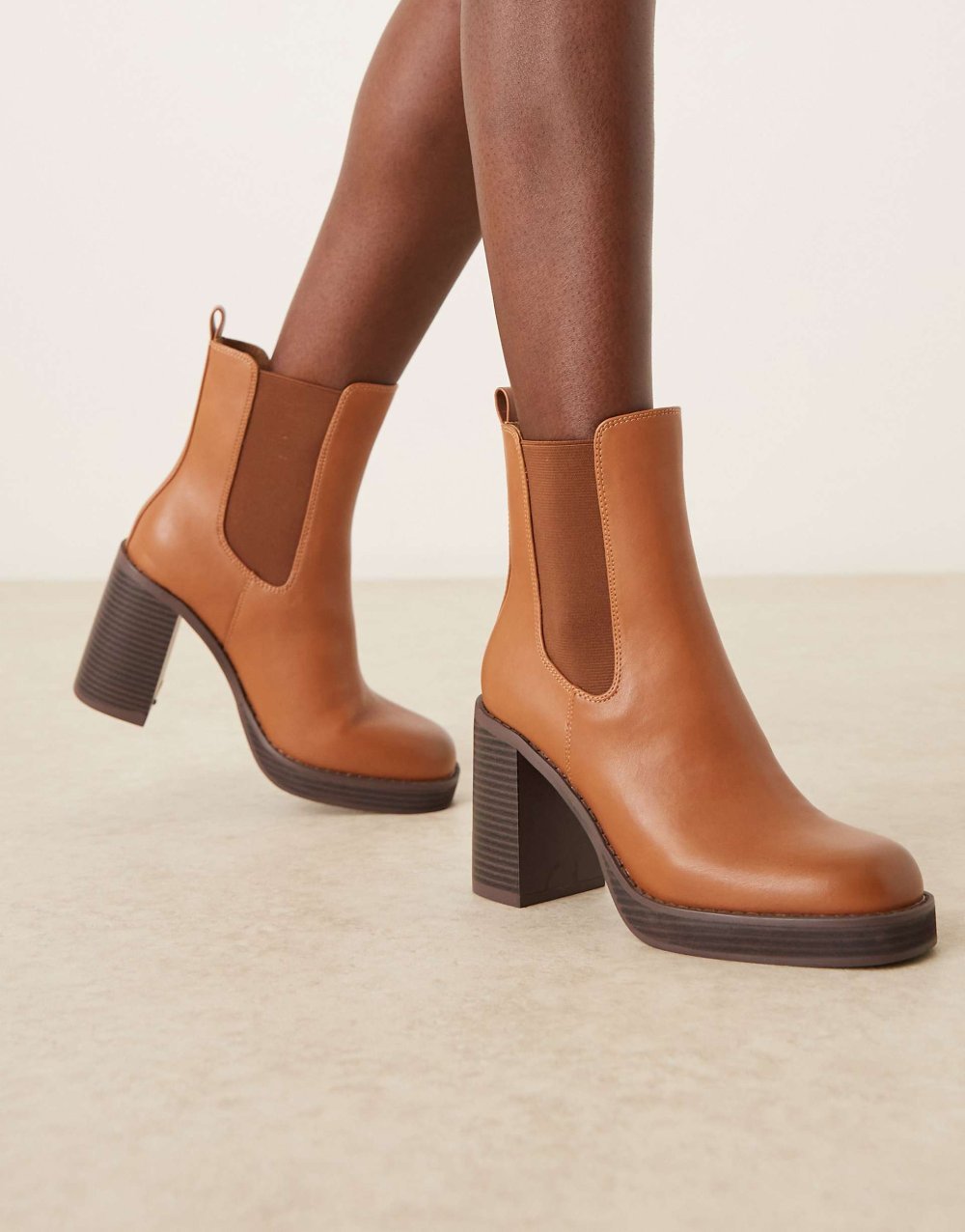 Platform heeled ankle boots in tan