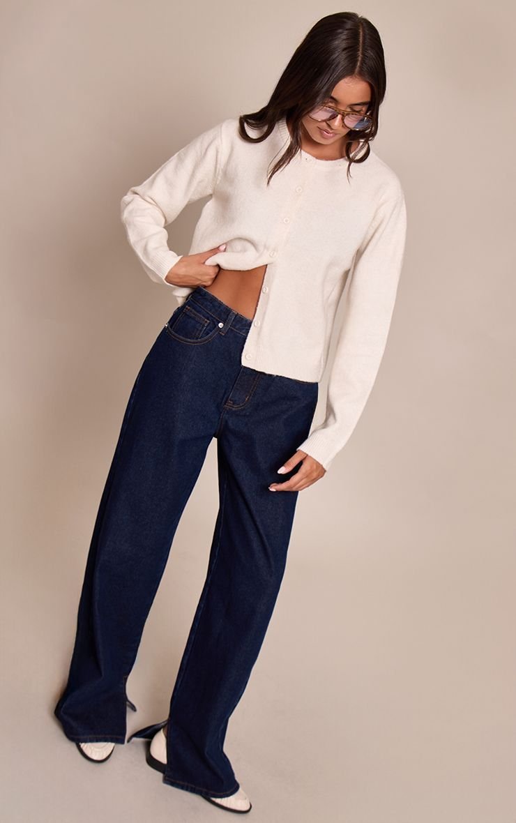 High-waisted boyfriend jeans with split hem