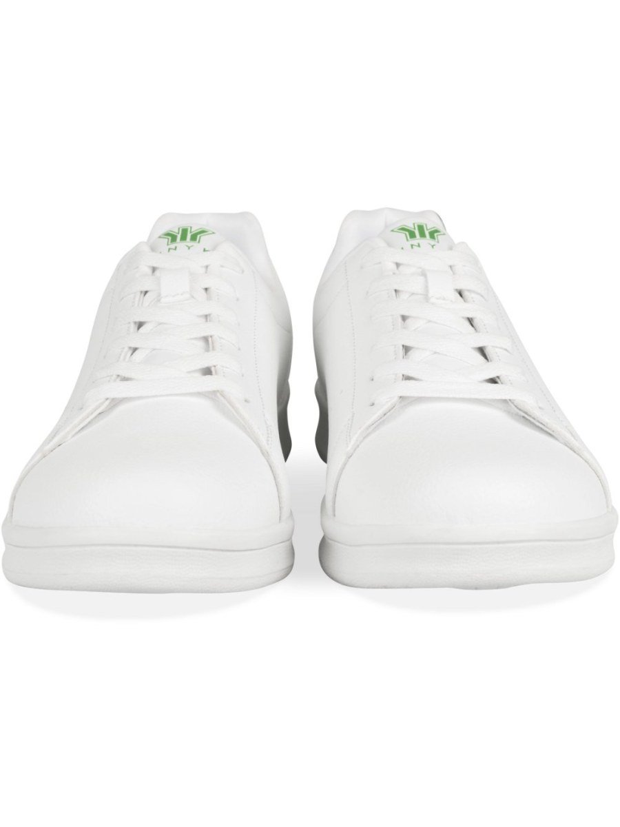 White and green perforated sneakers