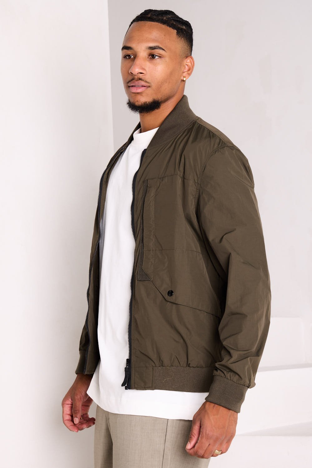 Khaki transitional jacket with high collar
