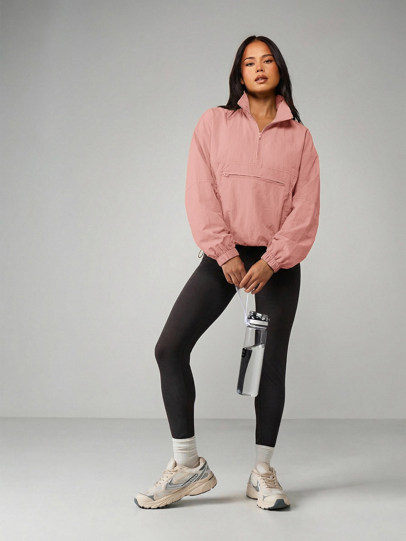 Oversized half-zip high neck windbreaker