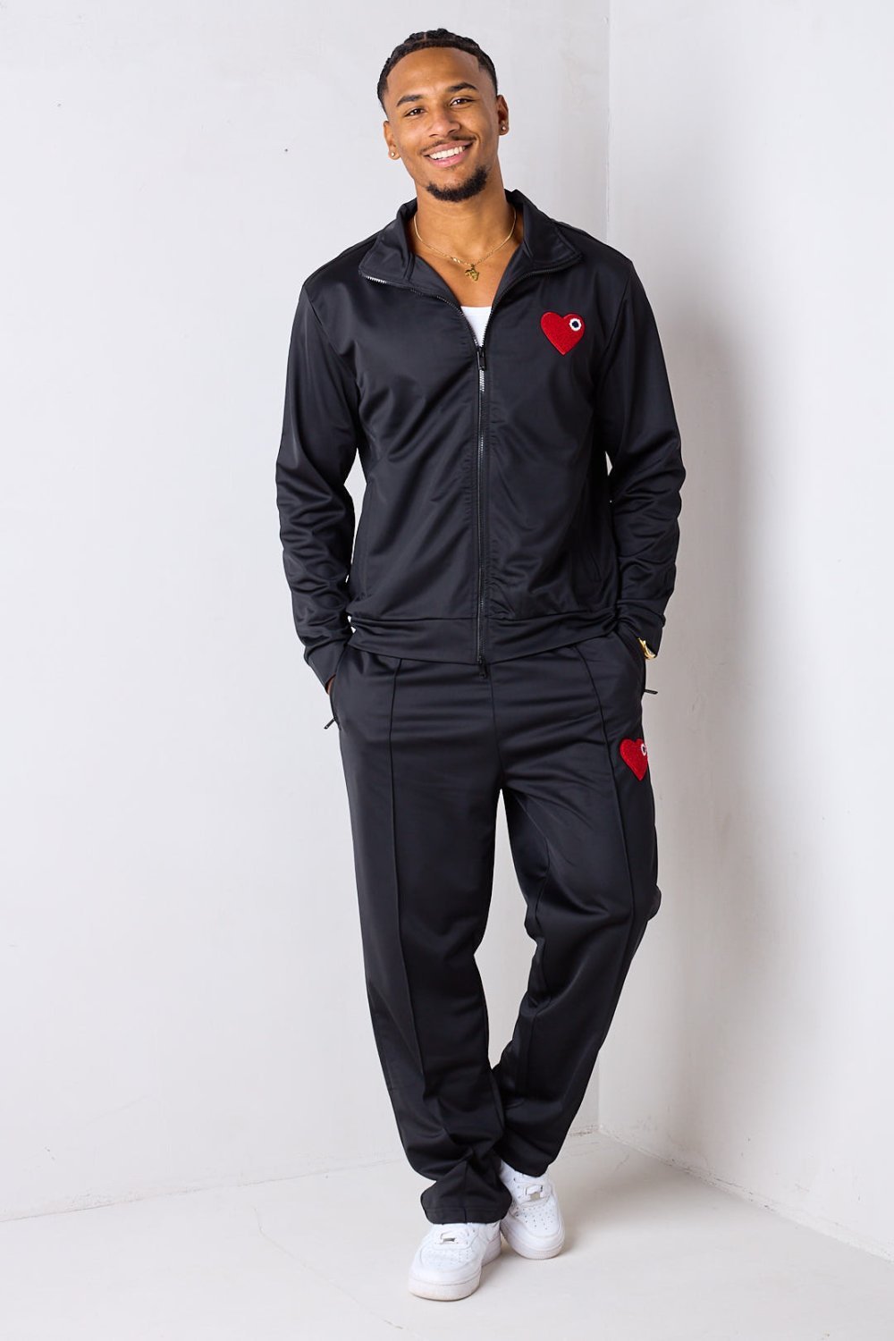 Black funnel-neck tracksuit with embroidered heart
