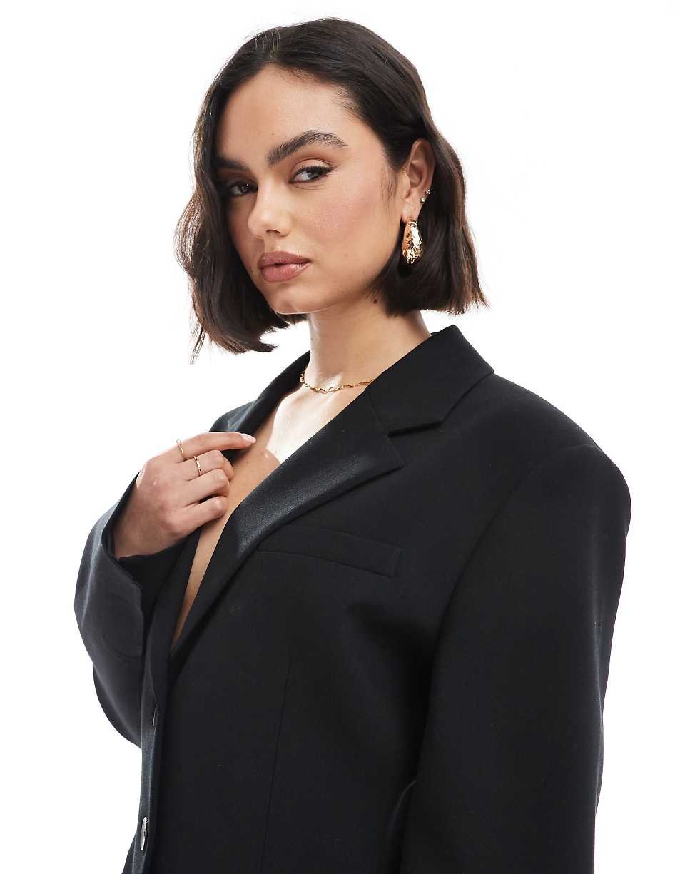 Blazer ajusté w msayg f taille, lon k7al