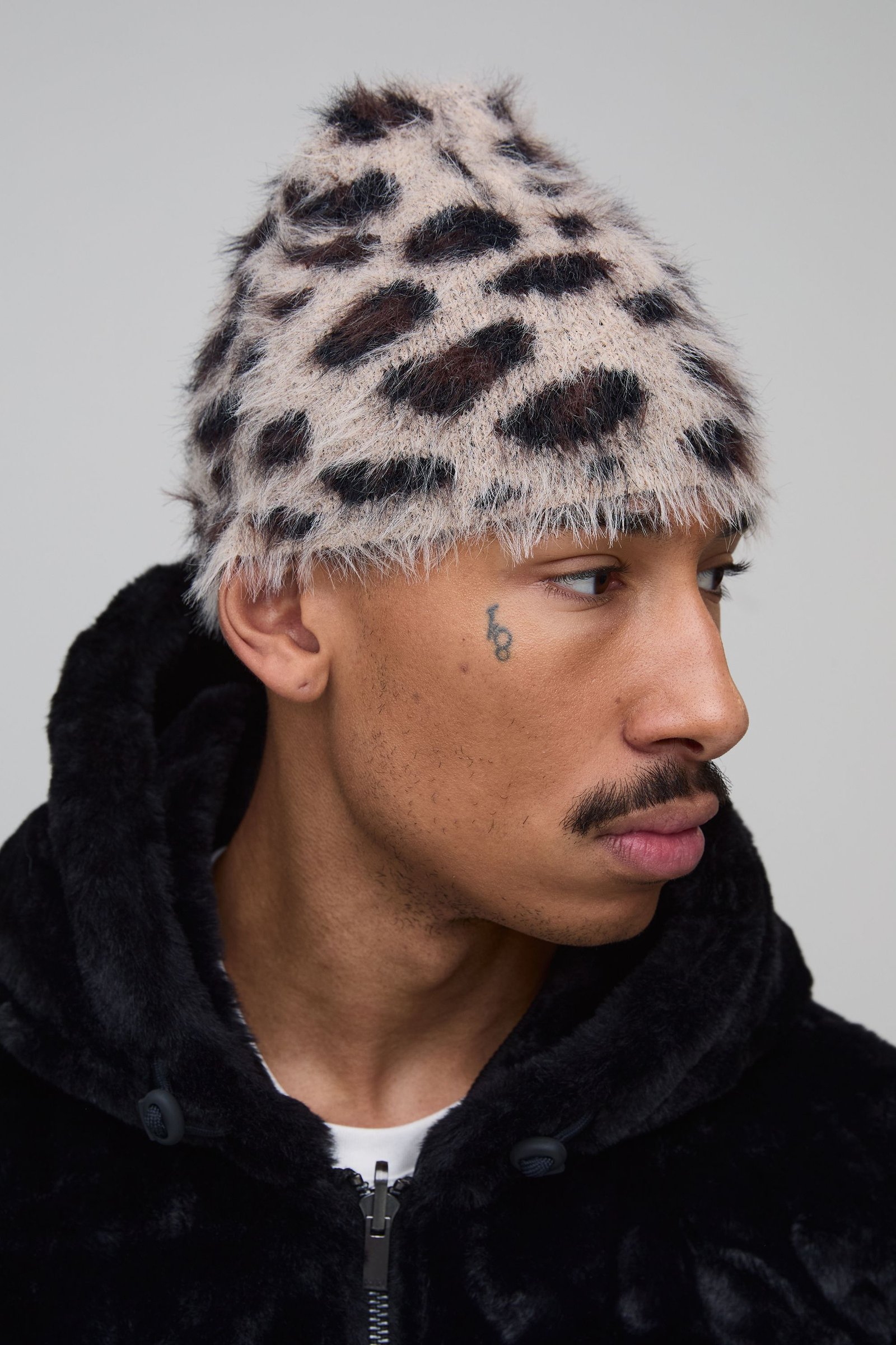 Bonnet léopard moelleux
