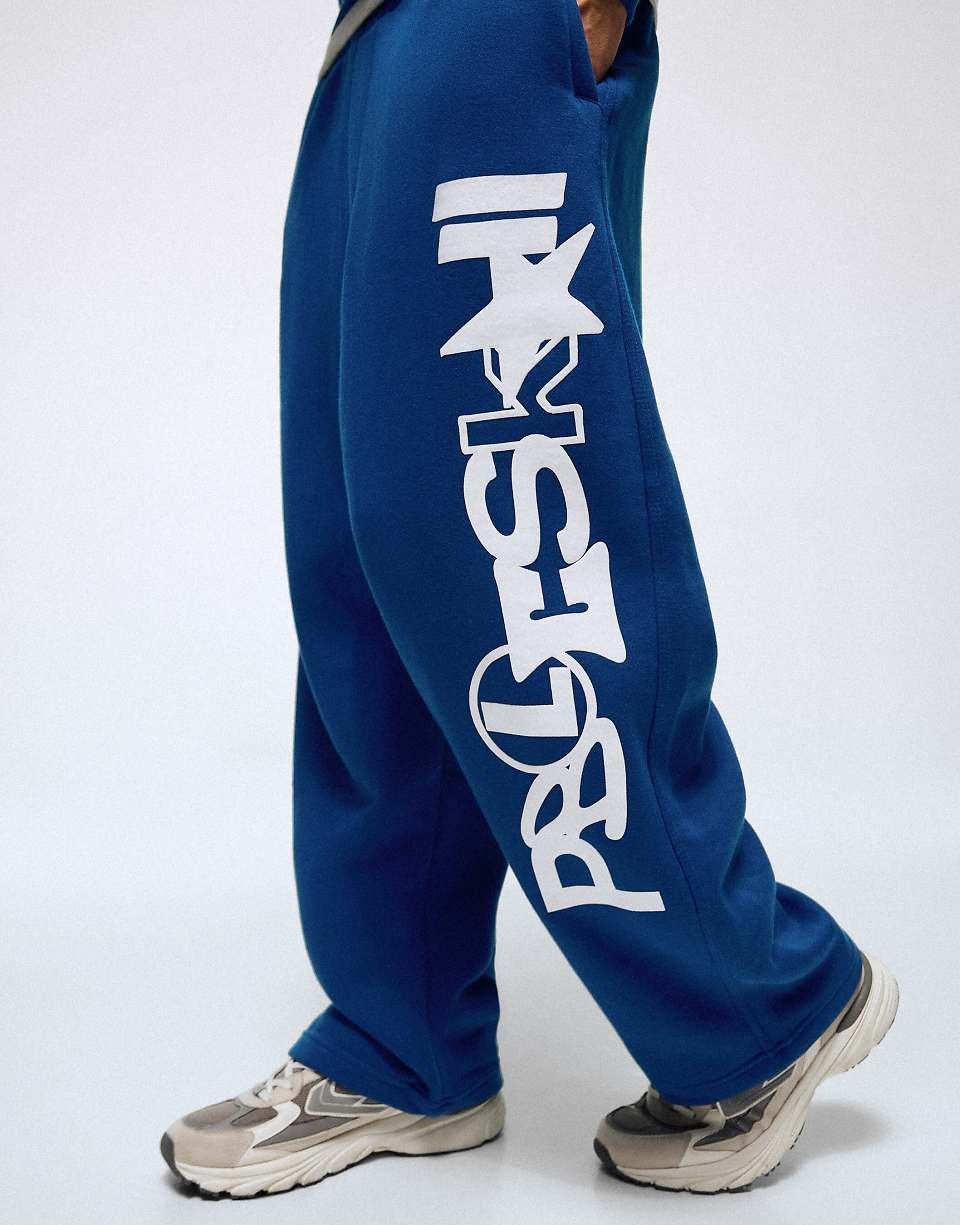 Pantalon ballon avec imprimé sur le côté en bleu