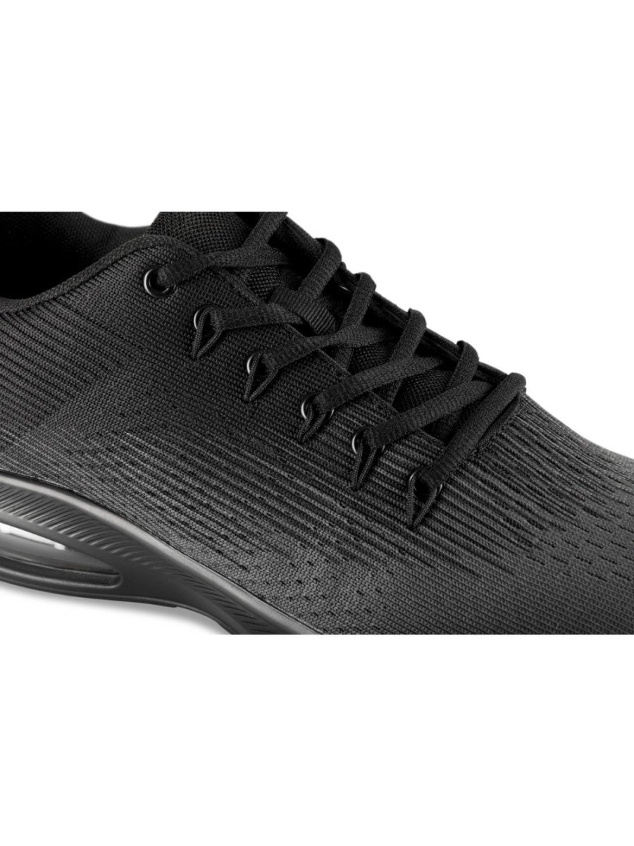 Grey and black sneakers with air bubble sole