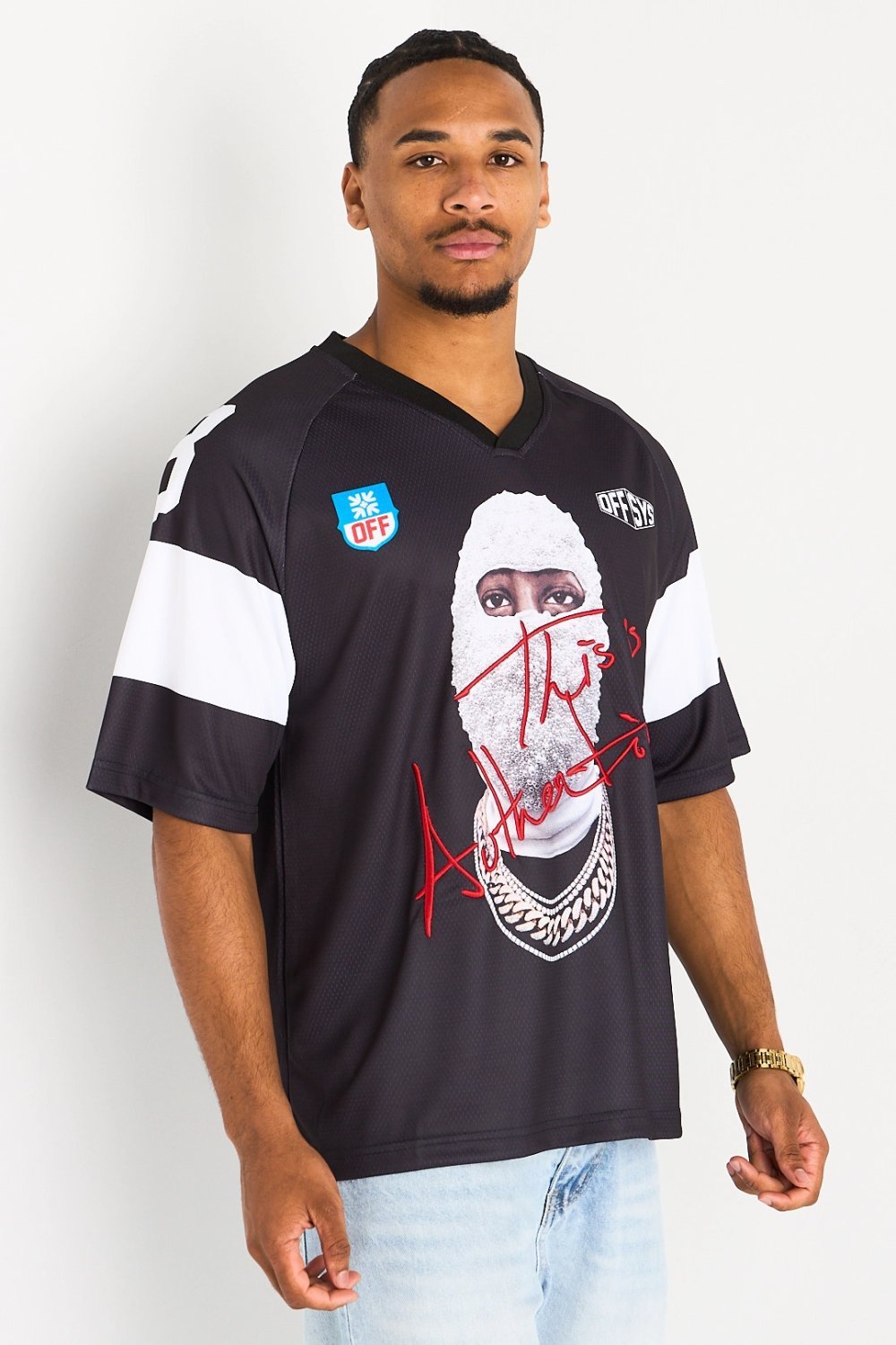 Black V-neck tee with face print