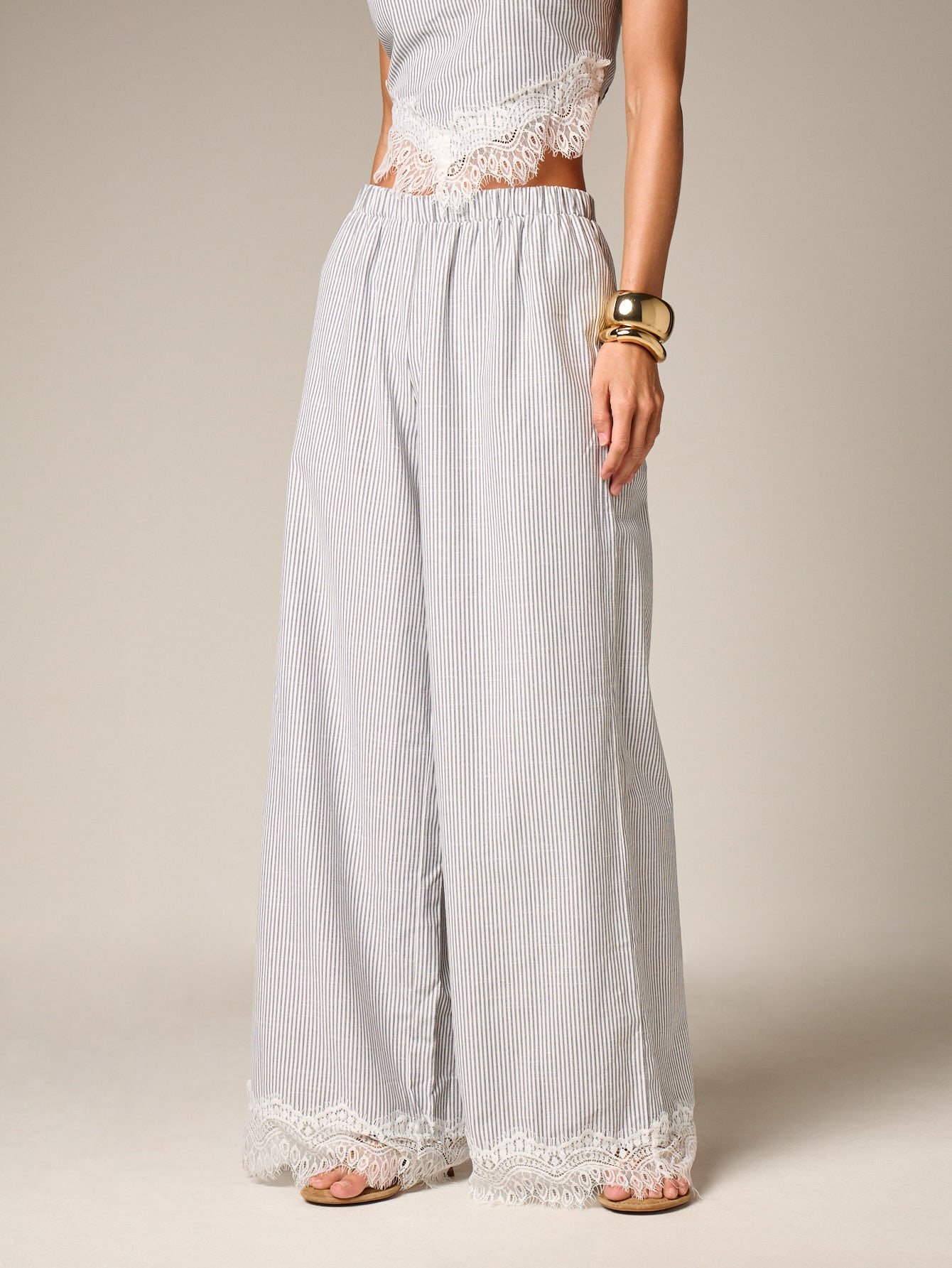 Pantalon palazzo à jambes larges avec ourlet