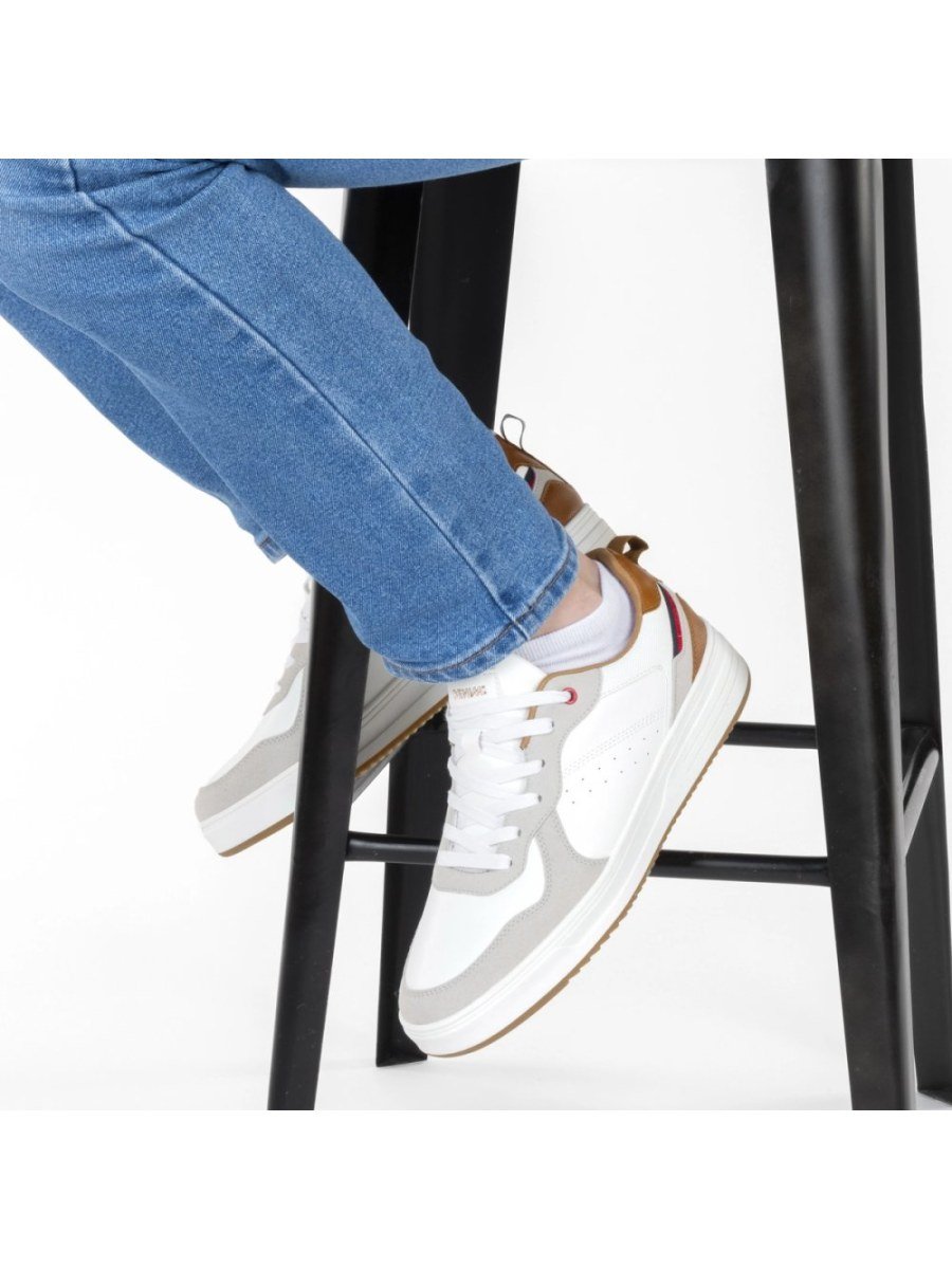 White retro sneakers with tan heel tab