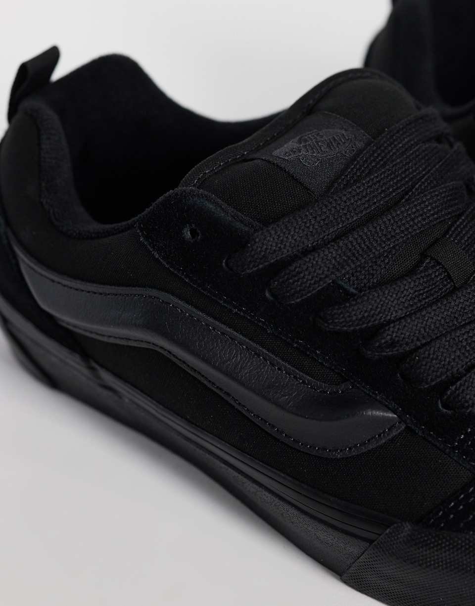 Knu Skool leather trainers in triple black
