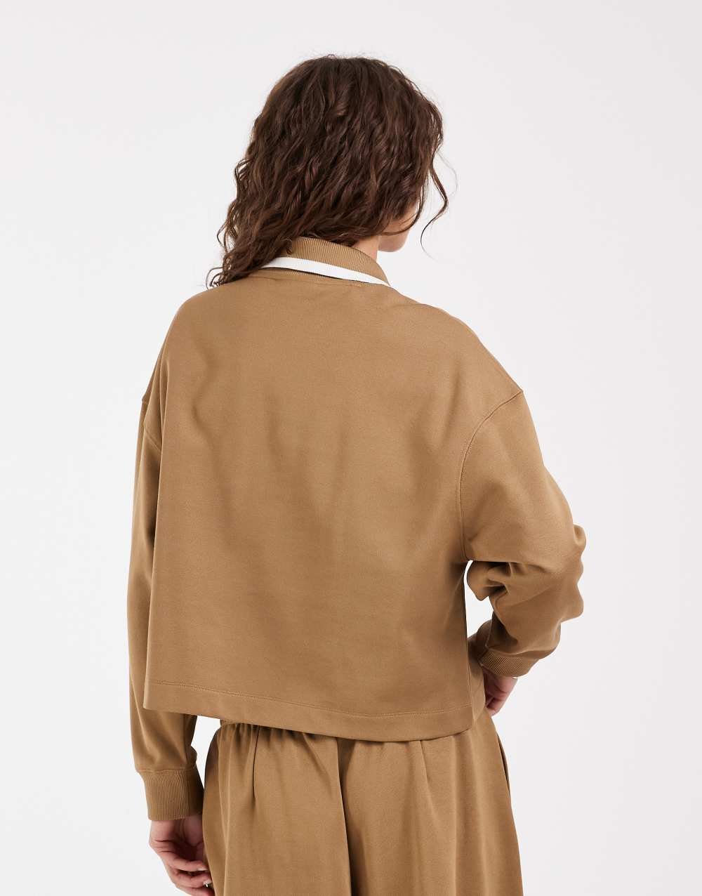 Polo manches longues à logo camel