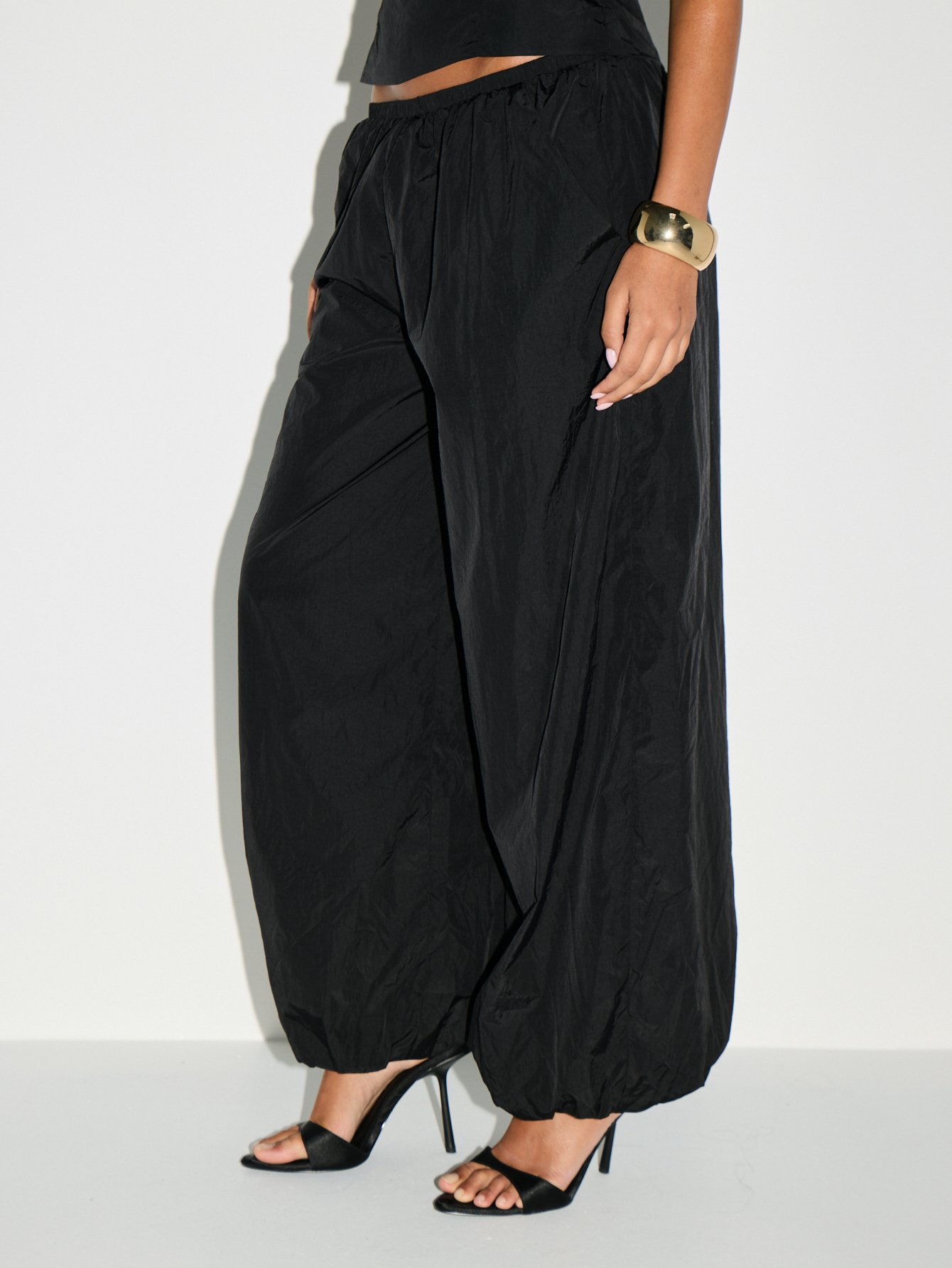 Oversized parachute trousers with gathered ankles