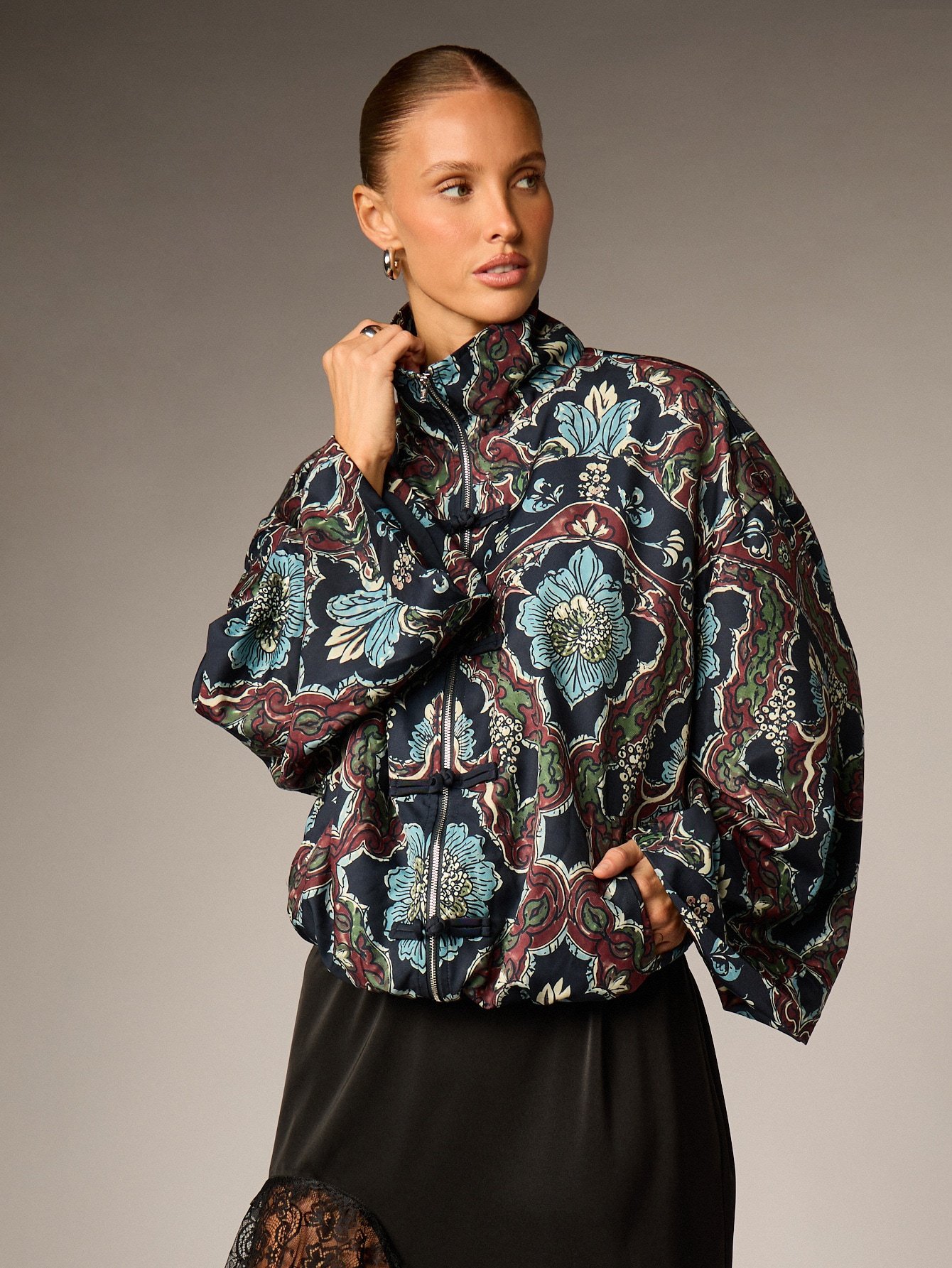 Oversized satin bomber jacket with floral print
