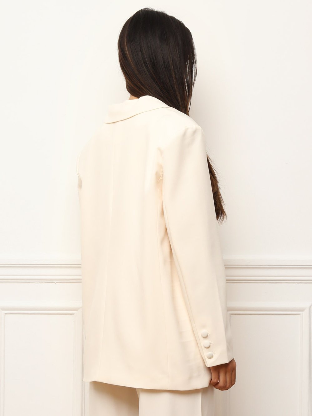 Beige oversized blazer with rounded patch pockets