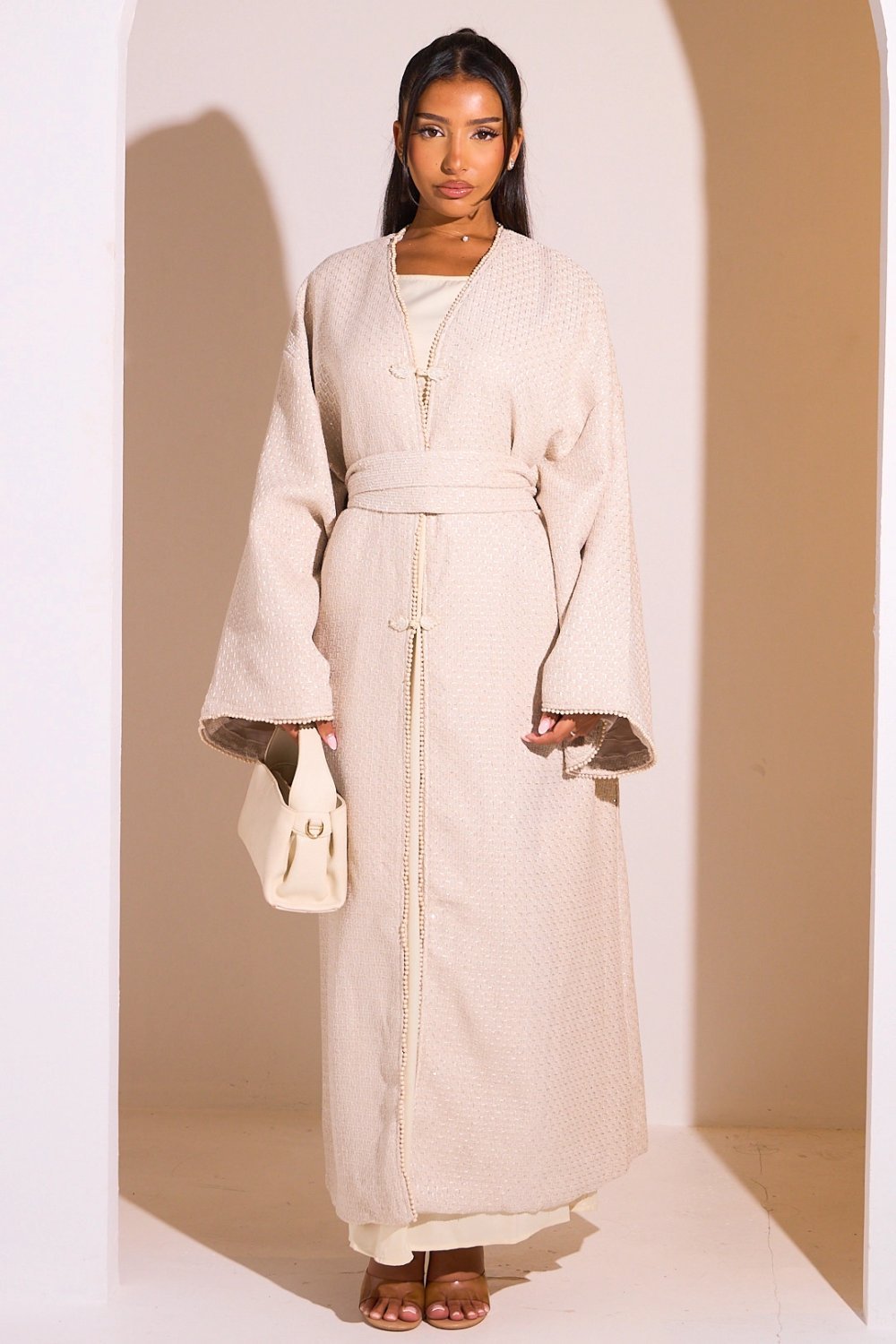 Beige belted openwork kimono with pearls