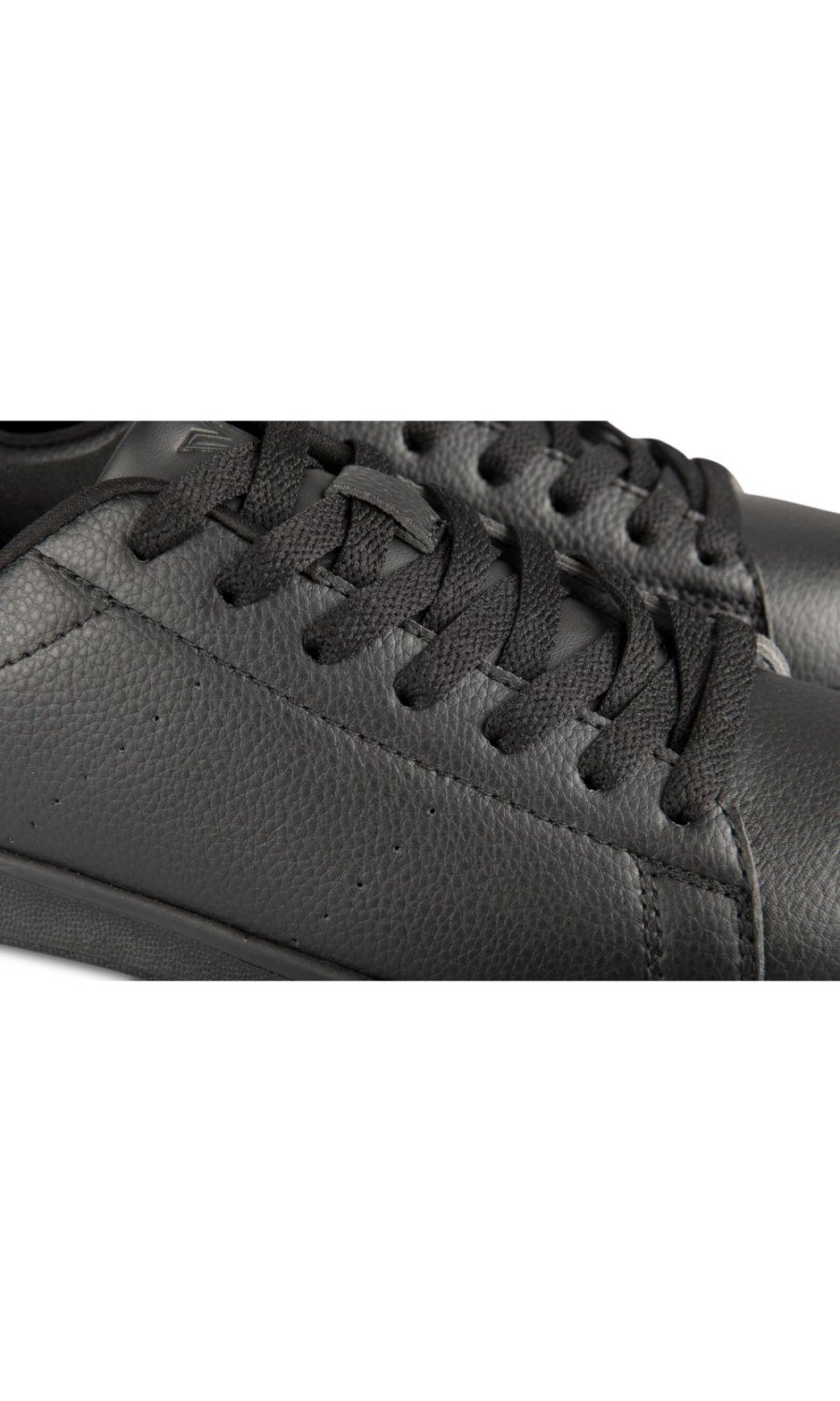 Black sneakers with gold heel tab