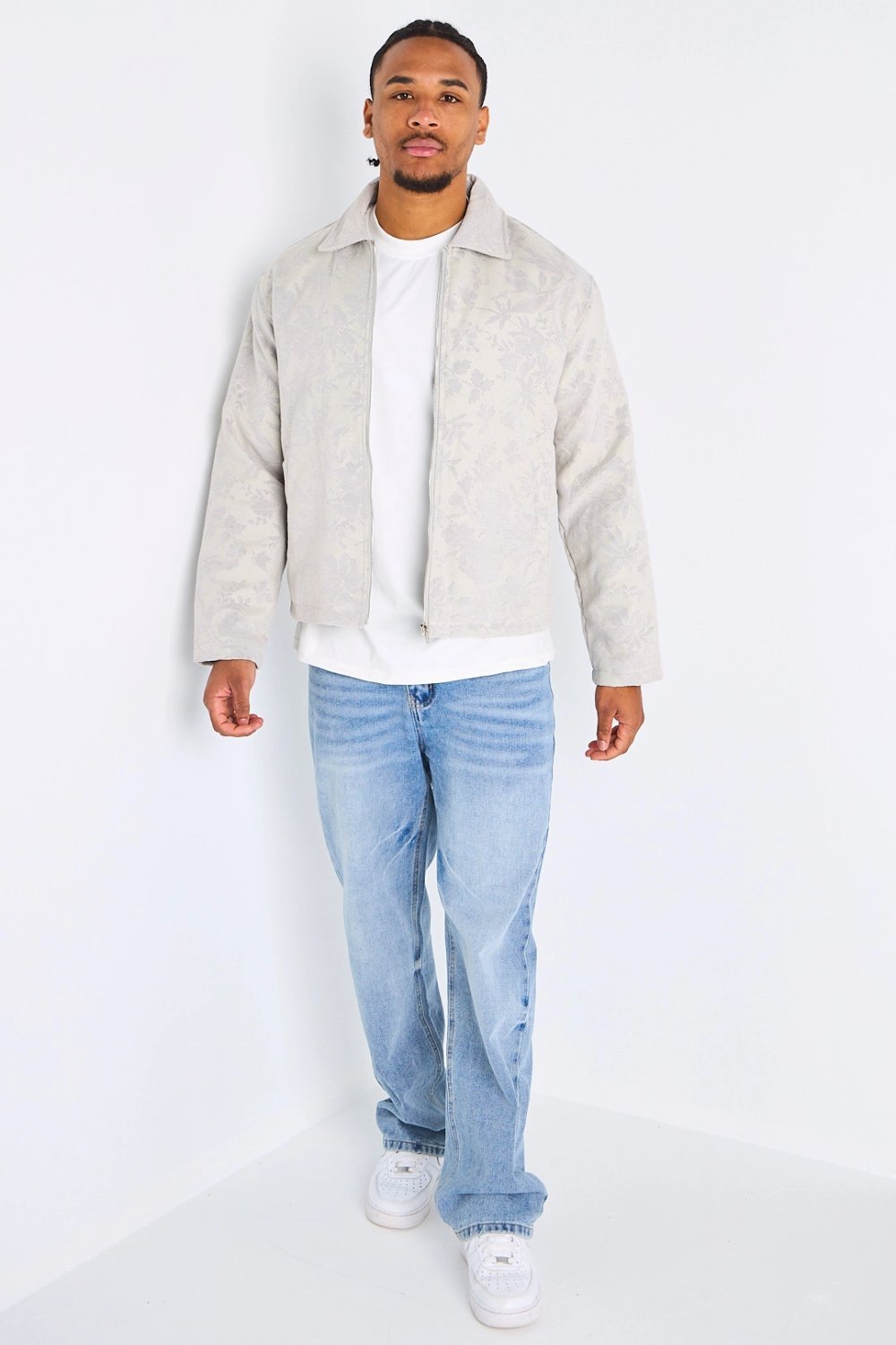 Light grey zip-up jacket with floral print