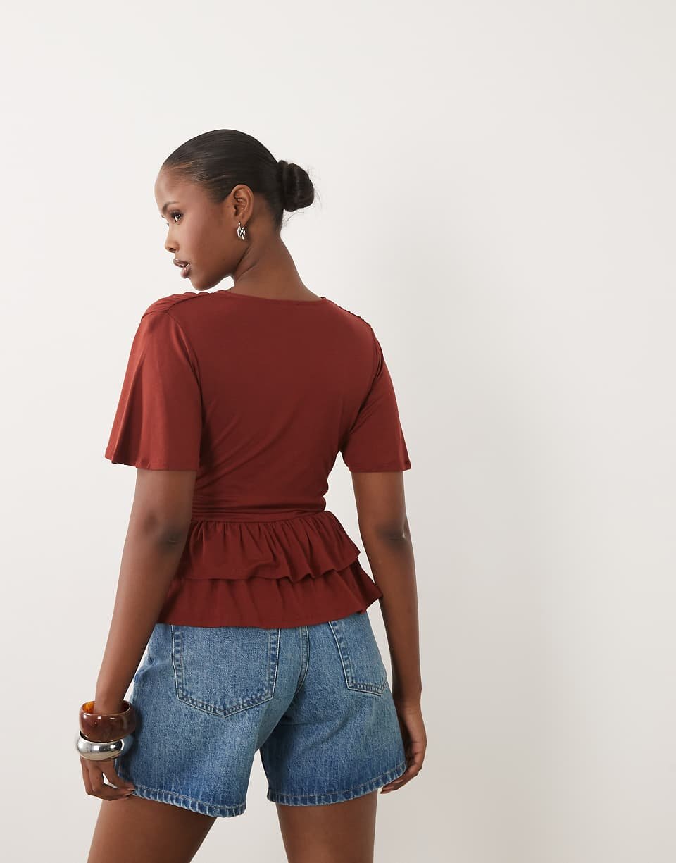 V-neck top with ruffled peplum - Rust