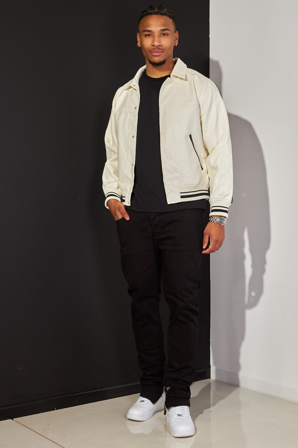 Ecru and black two-tone faux leather bomber