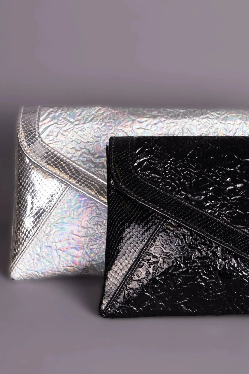 Holographic silver envelope clutch