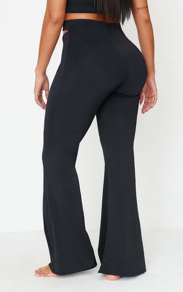 Sculpt cut out waist flared trousers