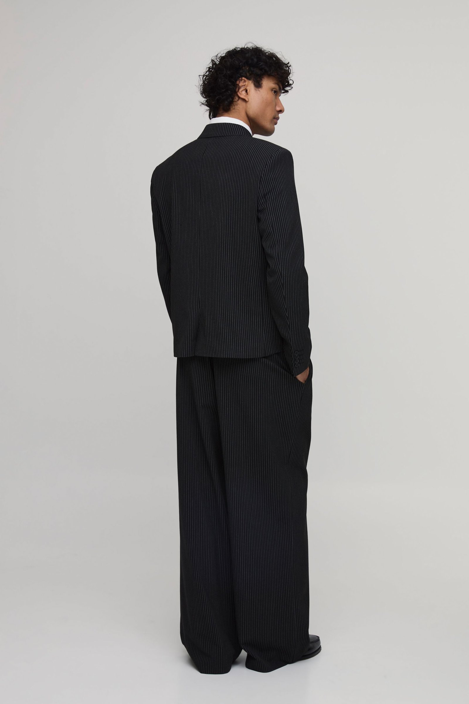 Pinstripe wide leg pleat front trousers