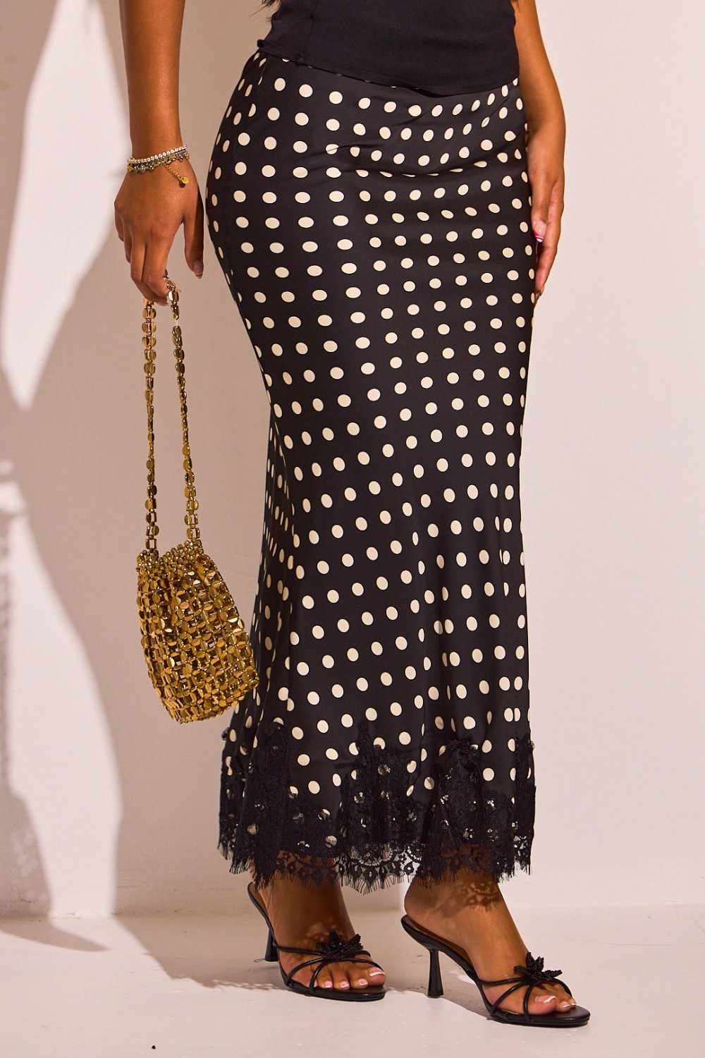 Jupe longue évasée à pois et dentelle noire
