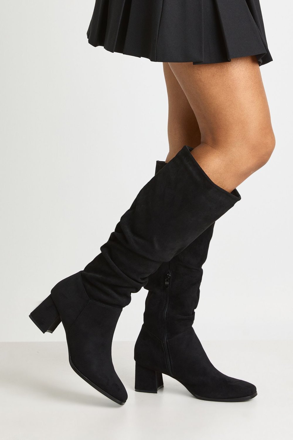 Slouchy faux suede knee-high boots