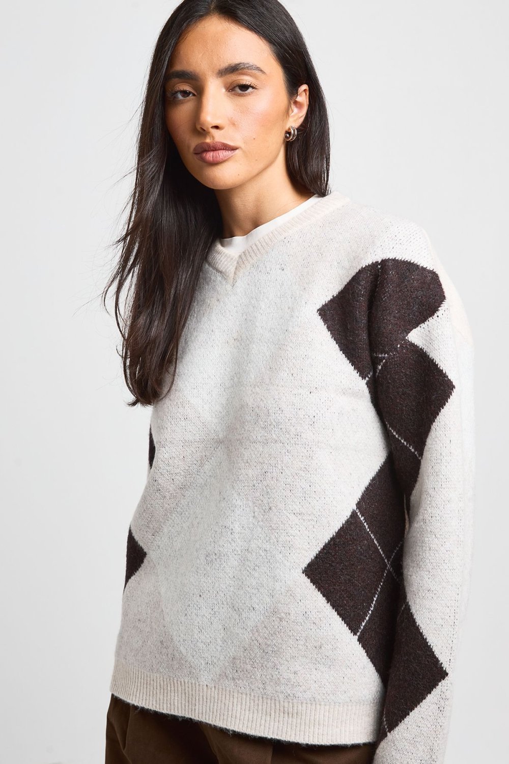 Ecru jumper with large argyle sleeves