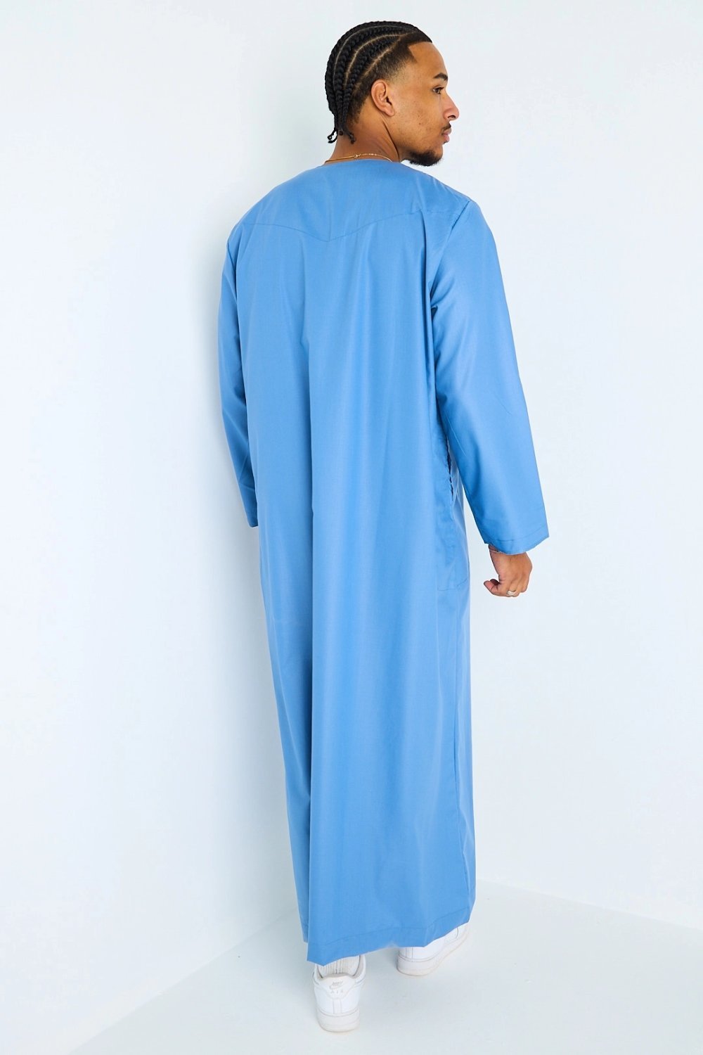 Long blue high-neck qamis with tassels