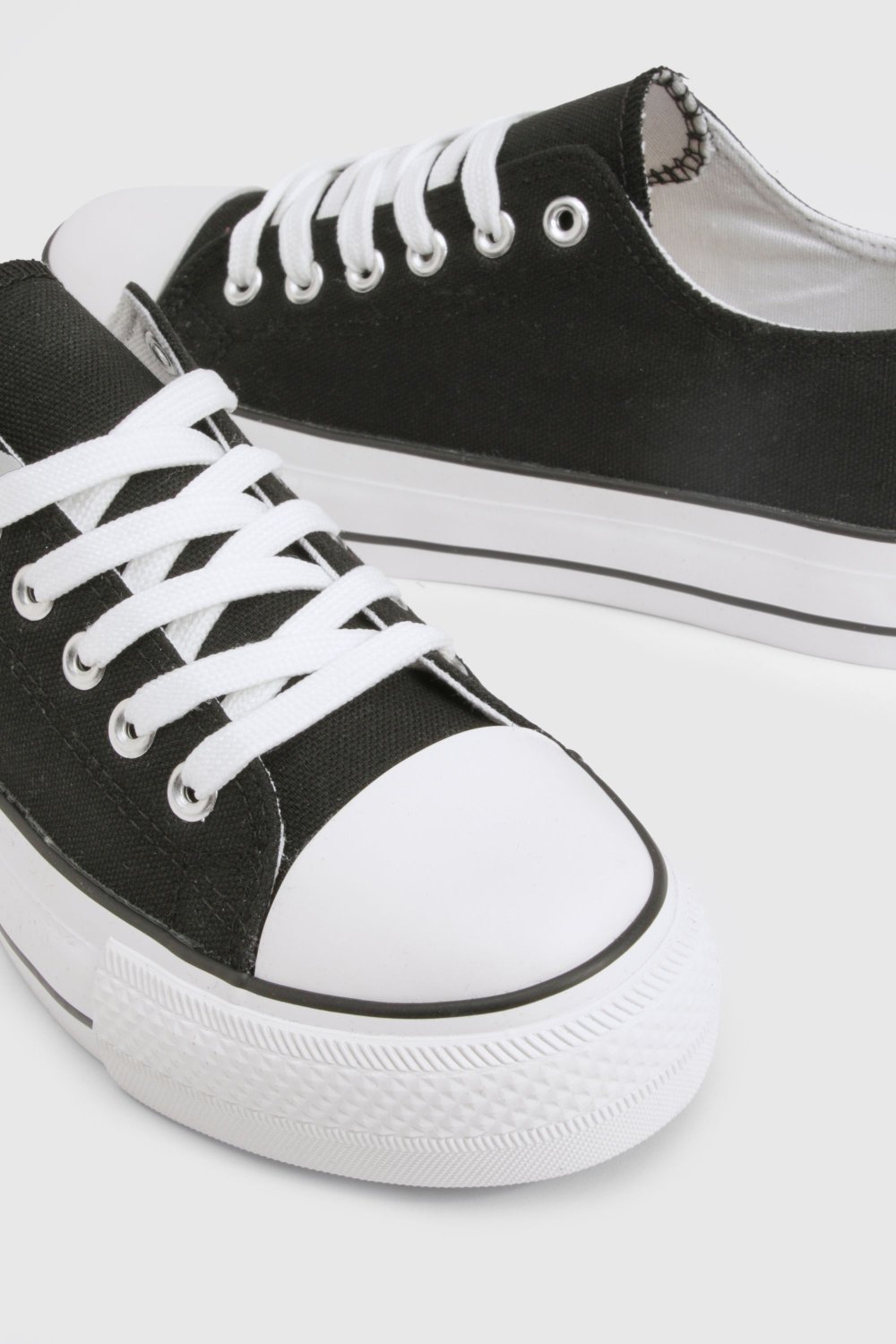 Black platform trainers