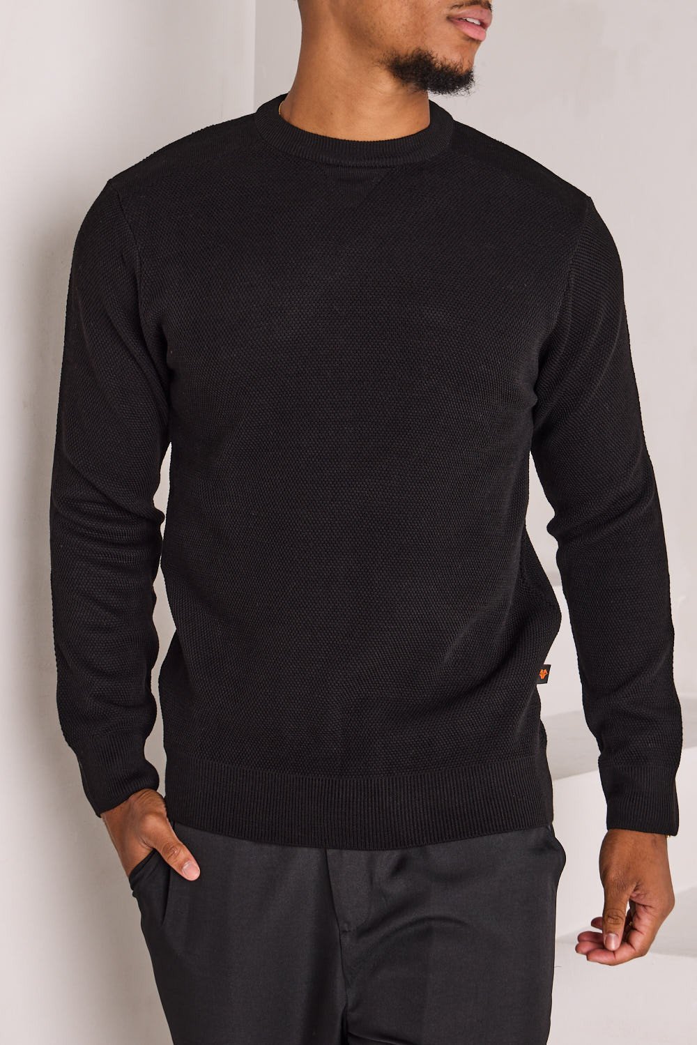Black knit crew-neck jumper