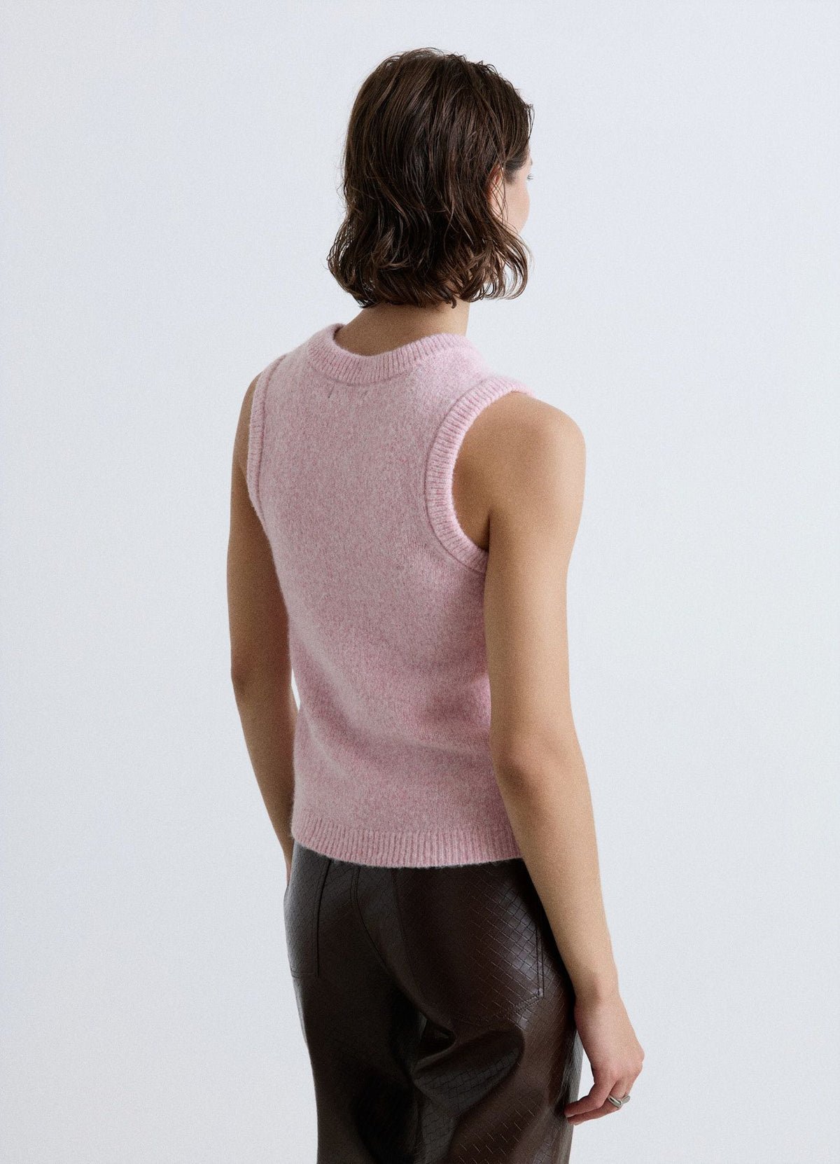 Sleeveless knit waistcoat